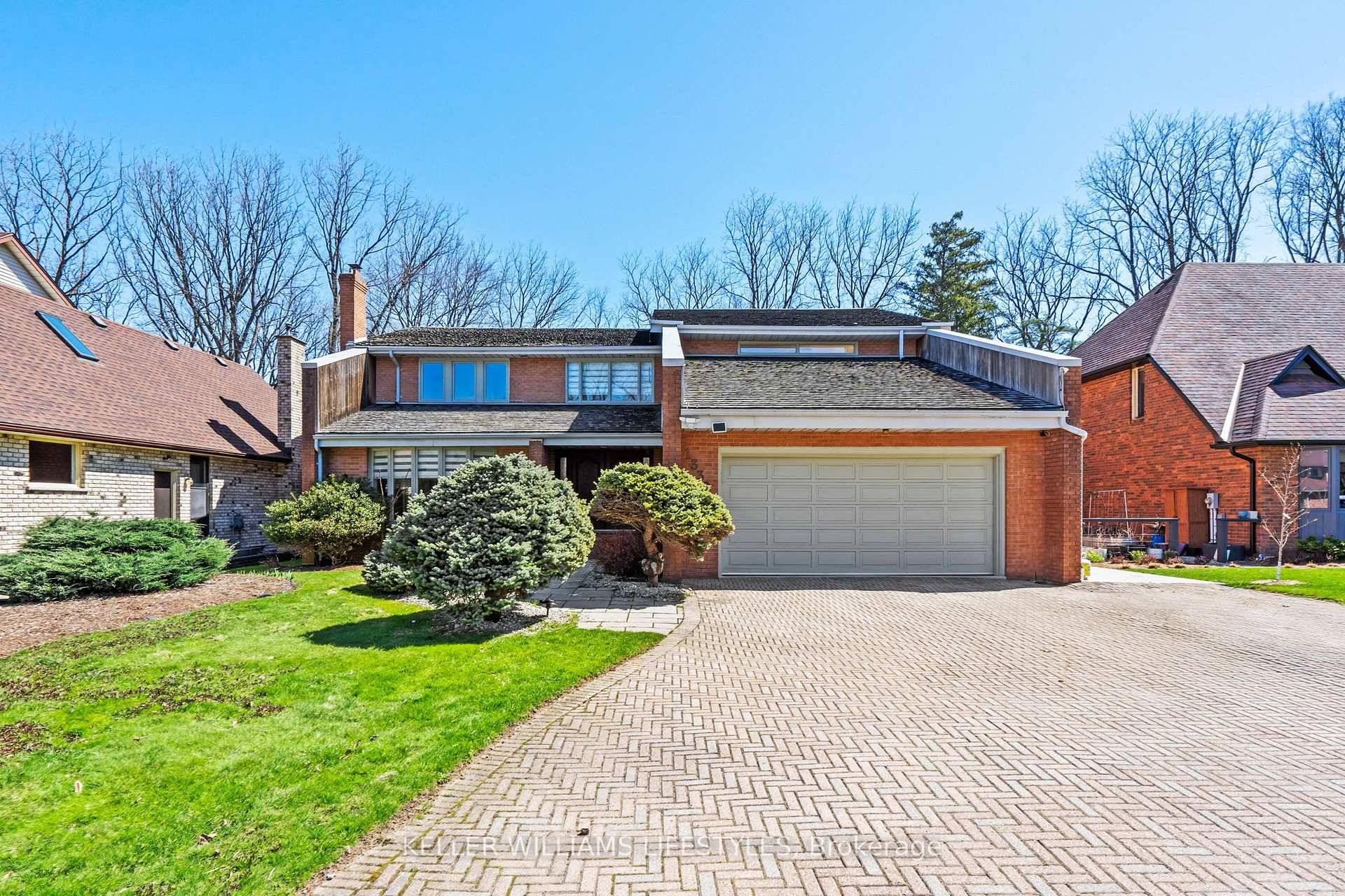 Step into refined living at 1330 Sprucedale Avenue, an architect designed executive home in North London's prestigious Stoney Creek Meadows.
