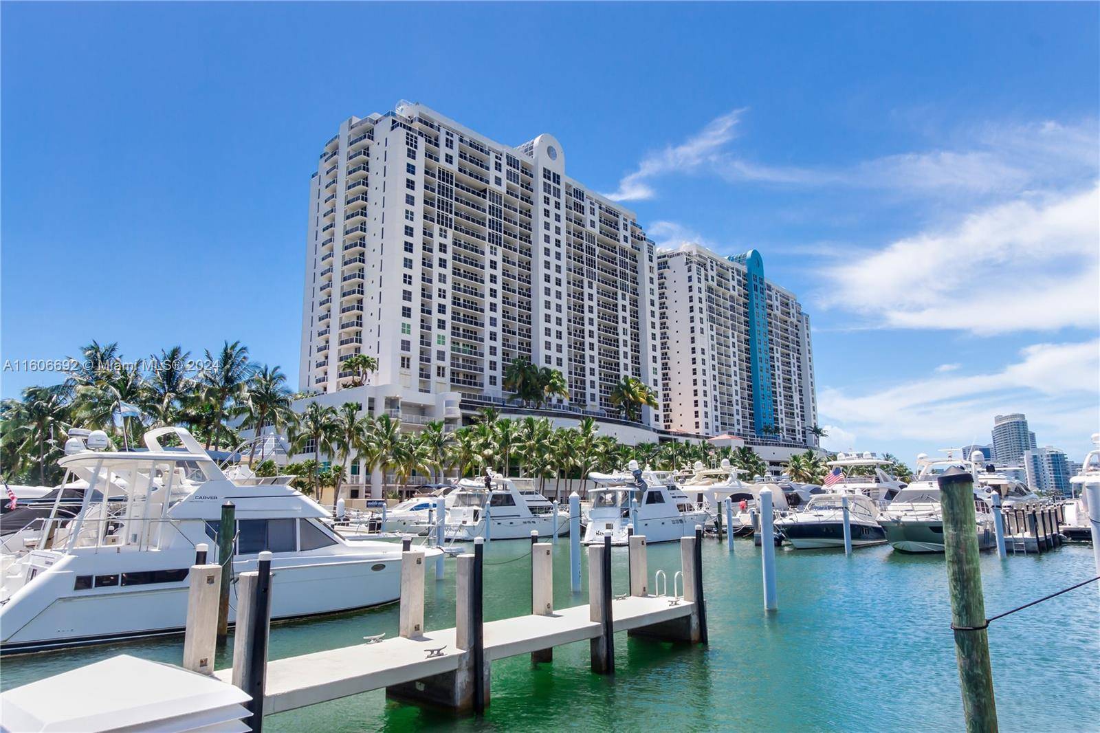 Rare waterfront value in Sunset Harbour a true corner 4 bedroom marina home with protected bay views from every room.