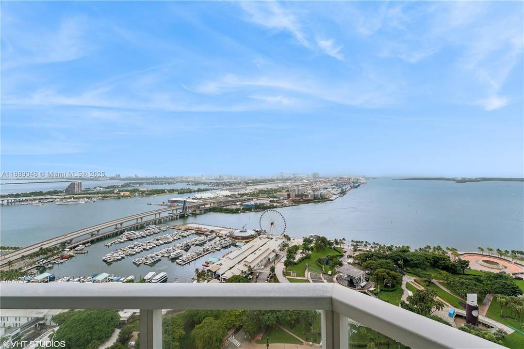 Truly Resort living. Enjoy unobstructed bay views from this elegant 2 Bed 2 baths den with two private balconies.