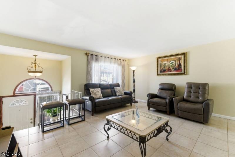 Welcome to this beautifully maintained semi attached home tucked away in one of North Bergen ?
