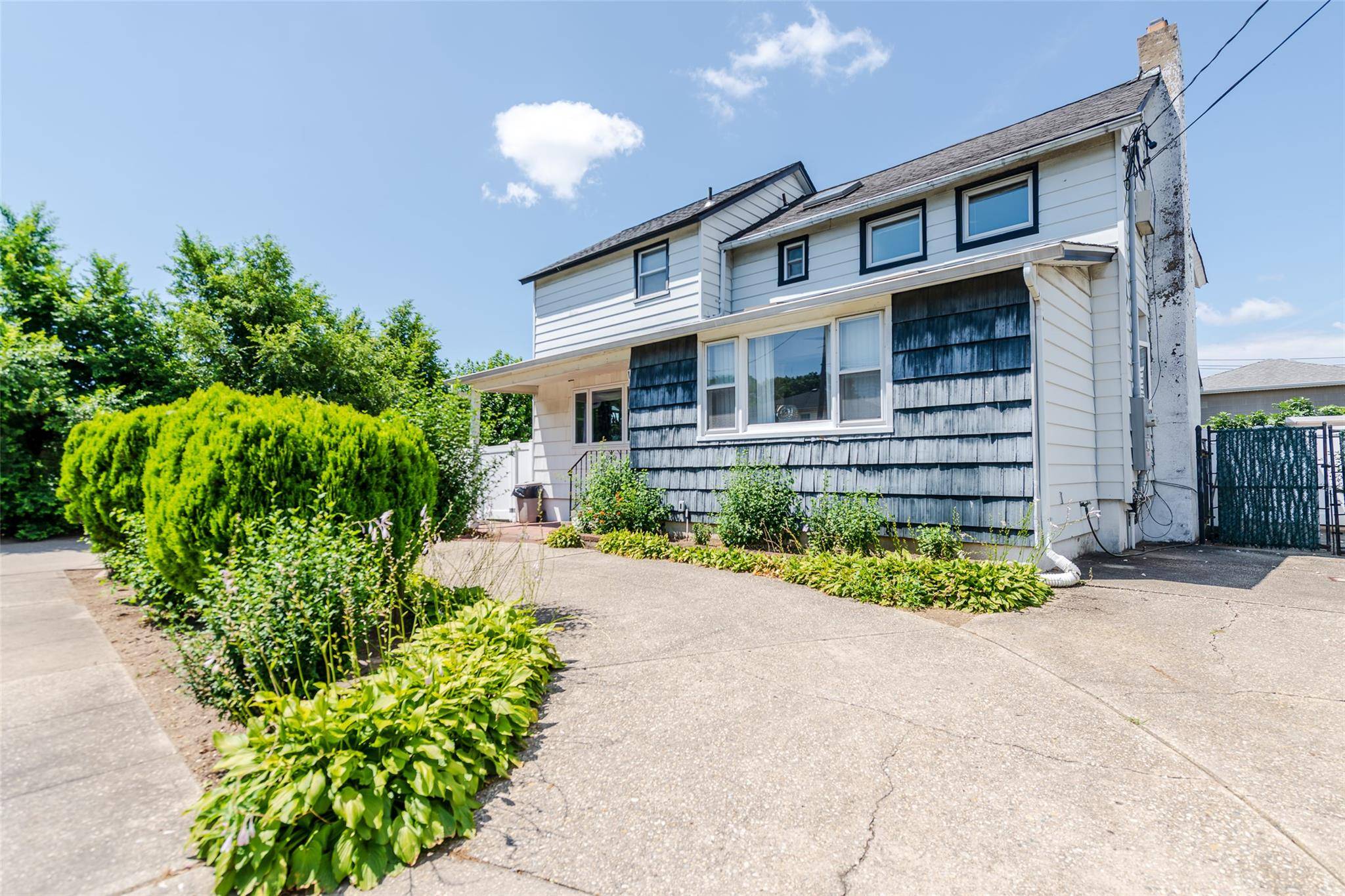 Spacious home tucked away on dead end street in the heart of town.