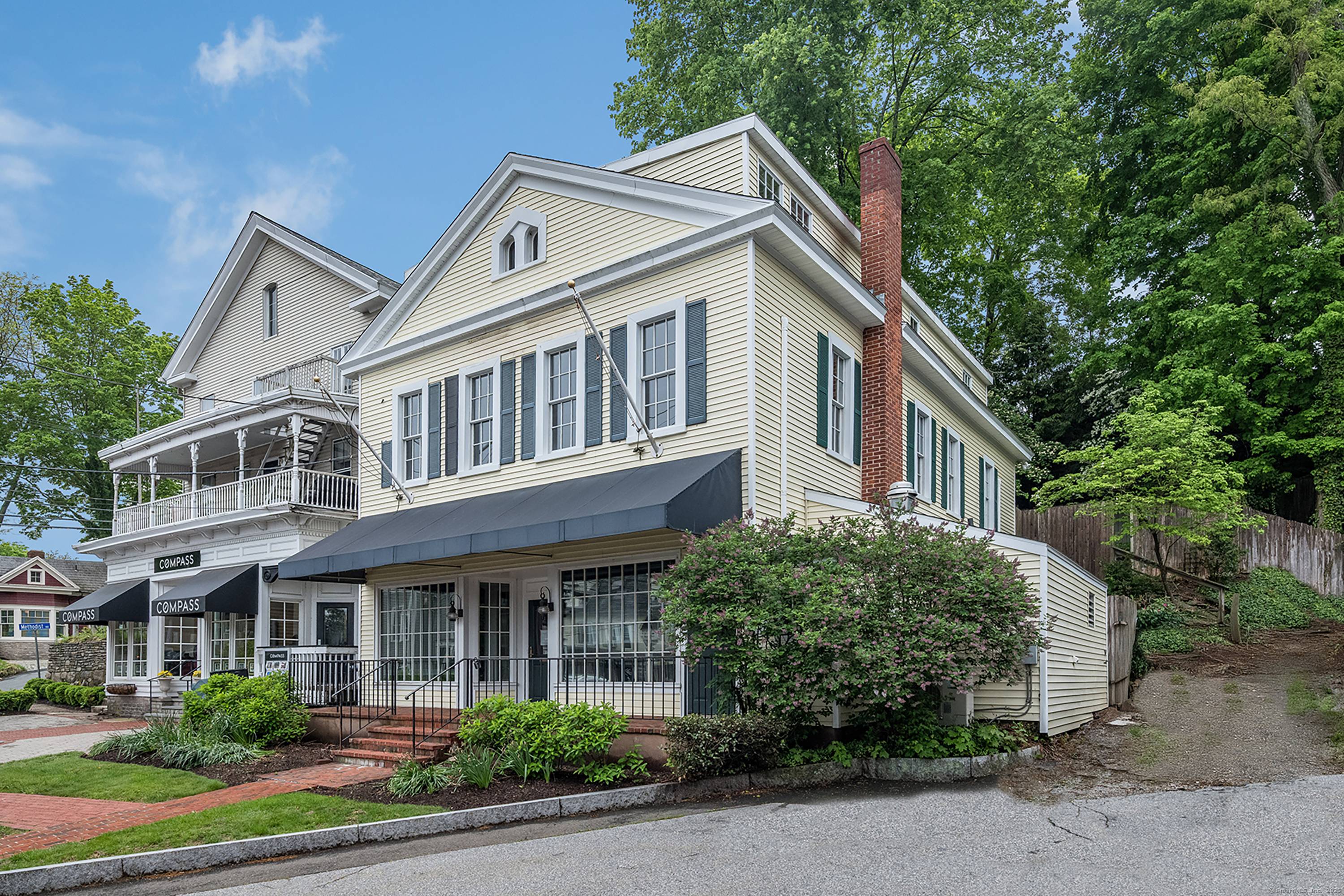 An iconic c. 1900 Essex commercial property for sale at the head of Main Street !