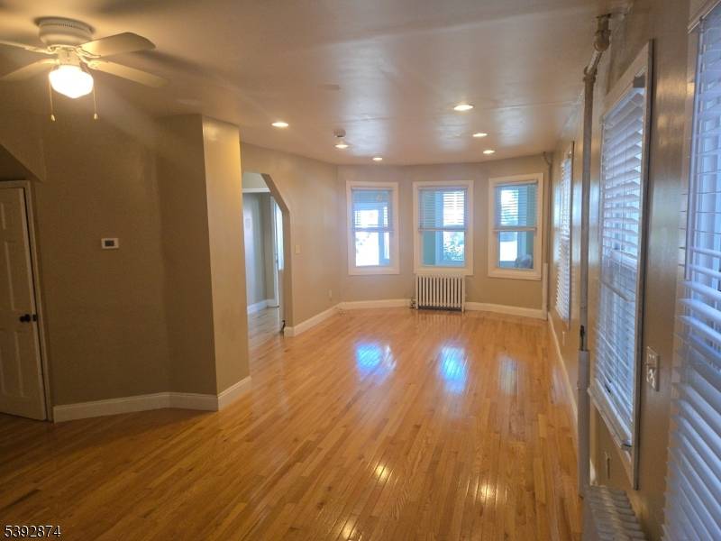 Charming 2 family home duplex located in West Orange NJ, offers a fantastic opportunity for investors or buyers looking to live in one unit while generating income from the other.