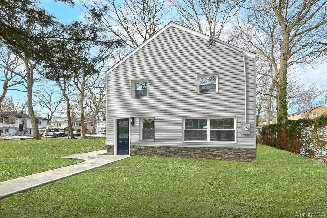 Beautifully Renovated Colonial in the Heart of Huntington with proximity to shopping, transportation, parks, beaches and schools.