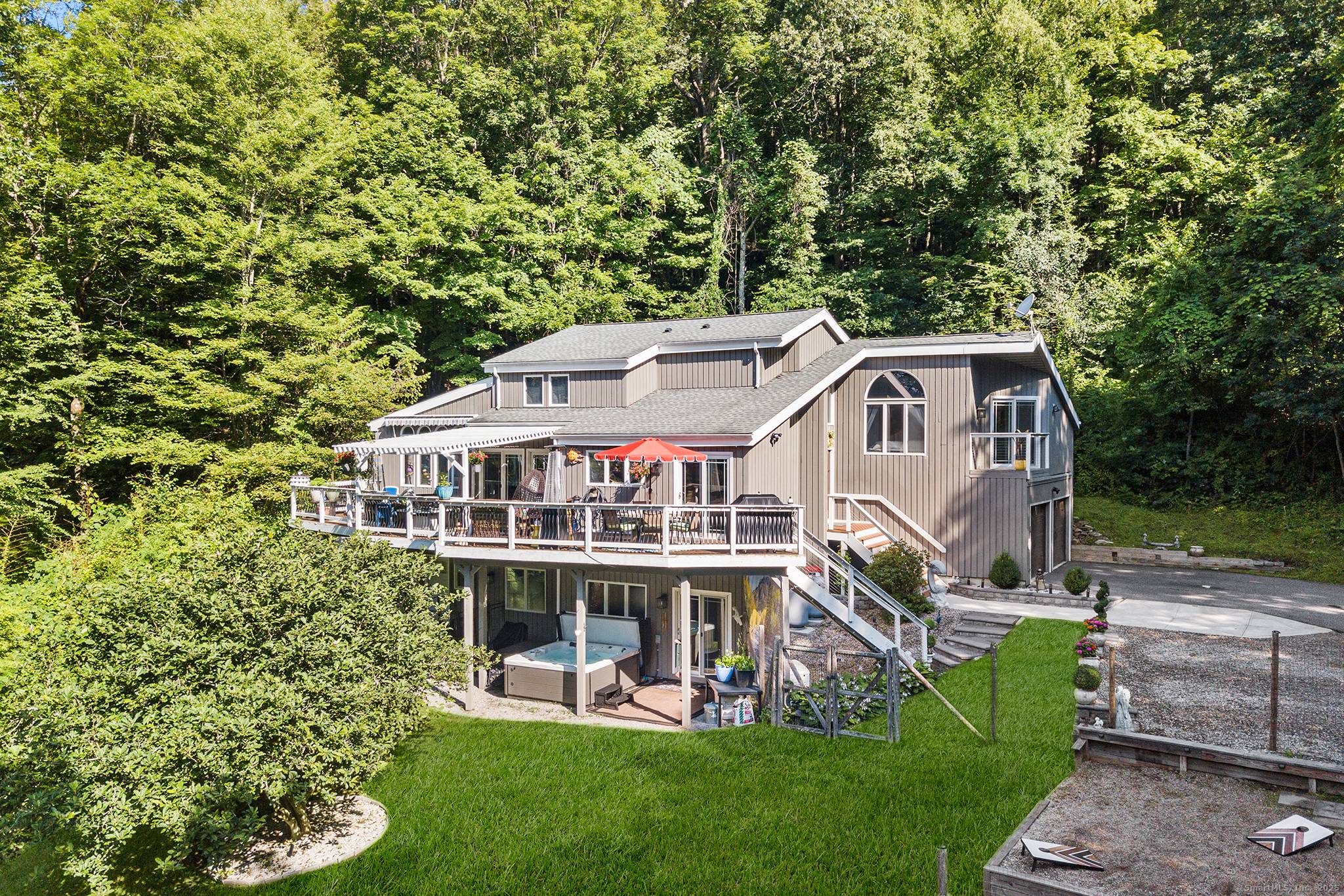 Your private oasis on 2. 93 acres that is only a 5 minute drive from shops, grocery stores, and restaurants, and trails.