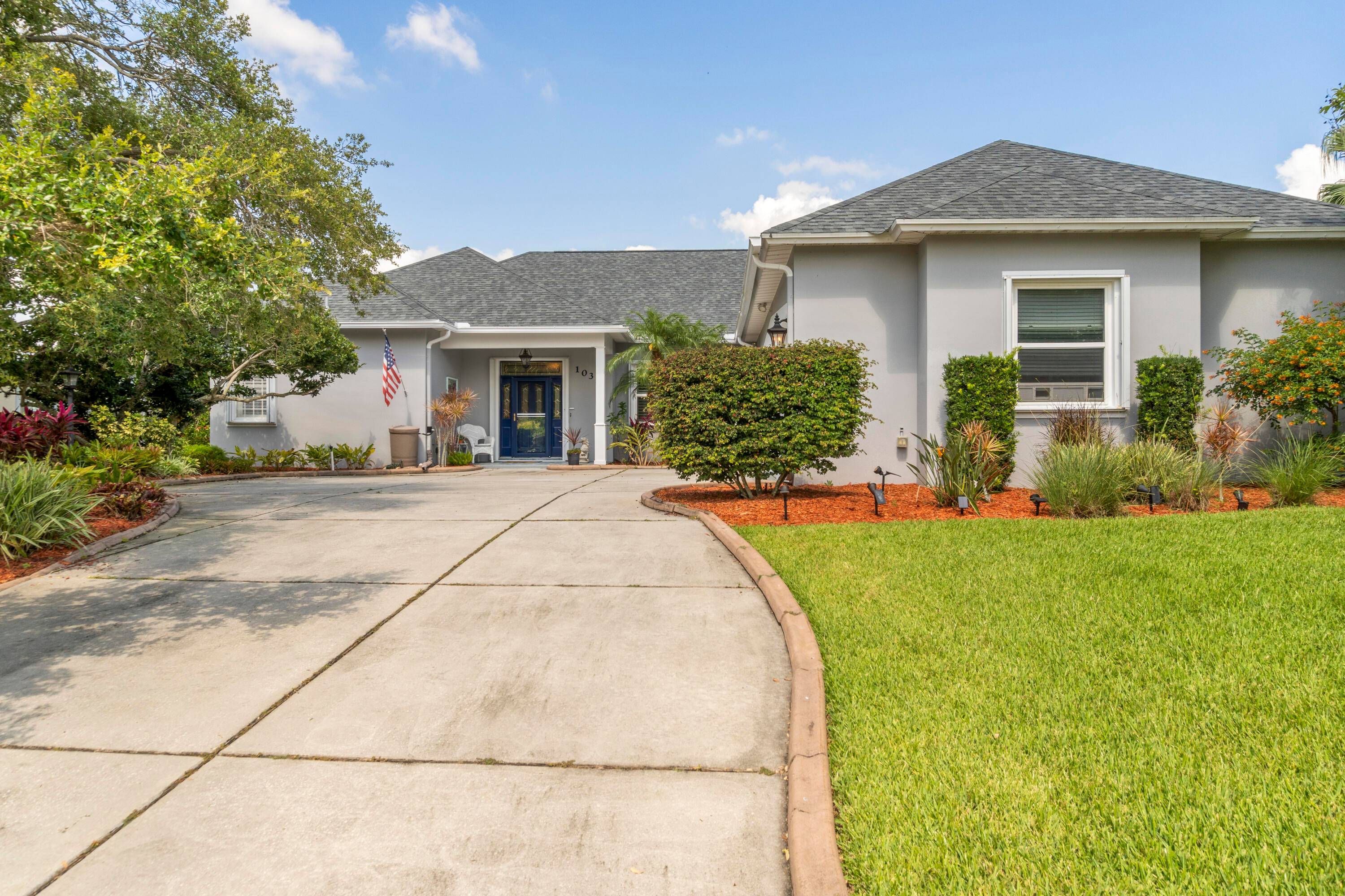 Stunning lakefront home in a pristine, gated community with low HOA !
