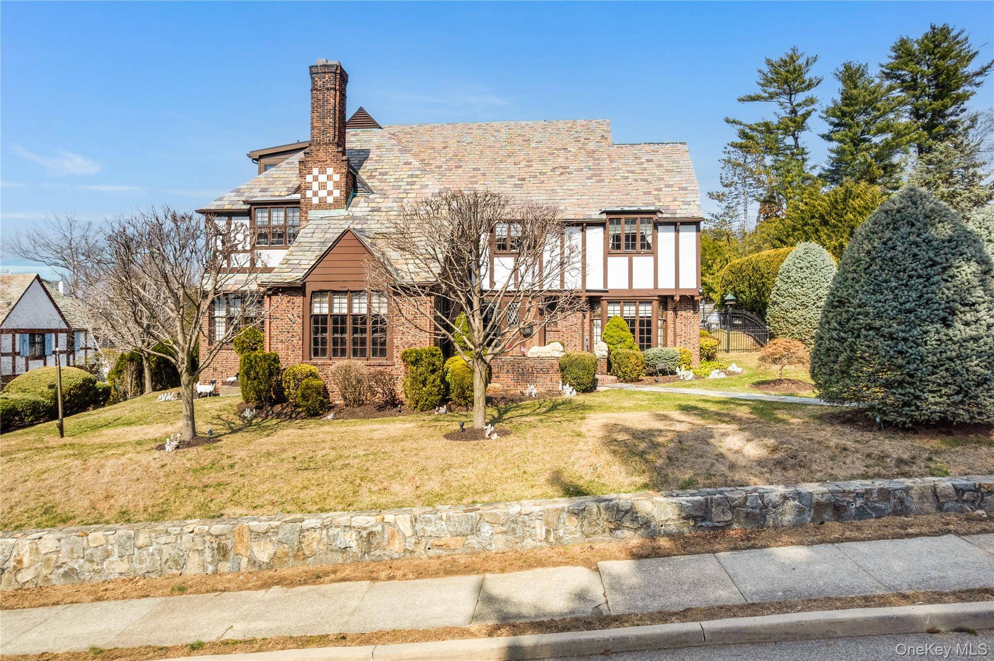 Perched atop Peekskill s acclaimed Mortgage Hill, this is a one of a kind stunning English Tudor home with unobstructed Hudson River views !