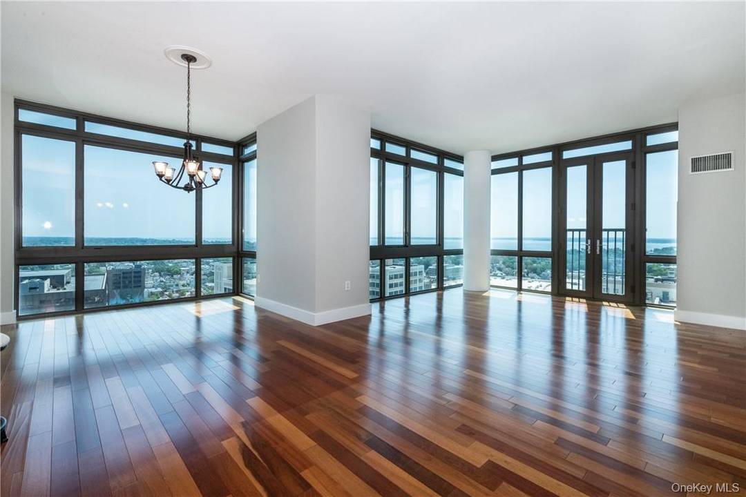 Own this Ultra luxurious large two bedroom, two and a half bath corner unit, 1475 square feet with high ceilings, gourmet kitchen with granite counter tops, Jenn air appliances, Brazilian ...