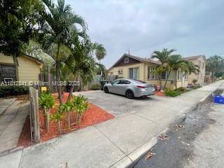 TWO Detached Homes ! Excellent Investment Opportunity Each home features a separate street address, individual utility meters, private fenced backyard, and two off street parking spaces.