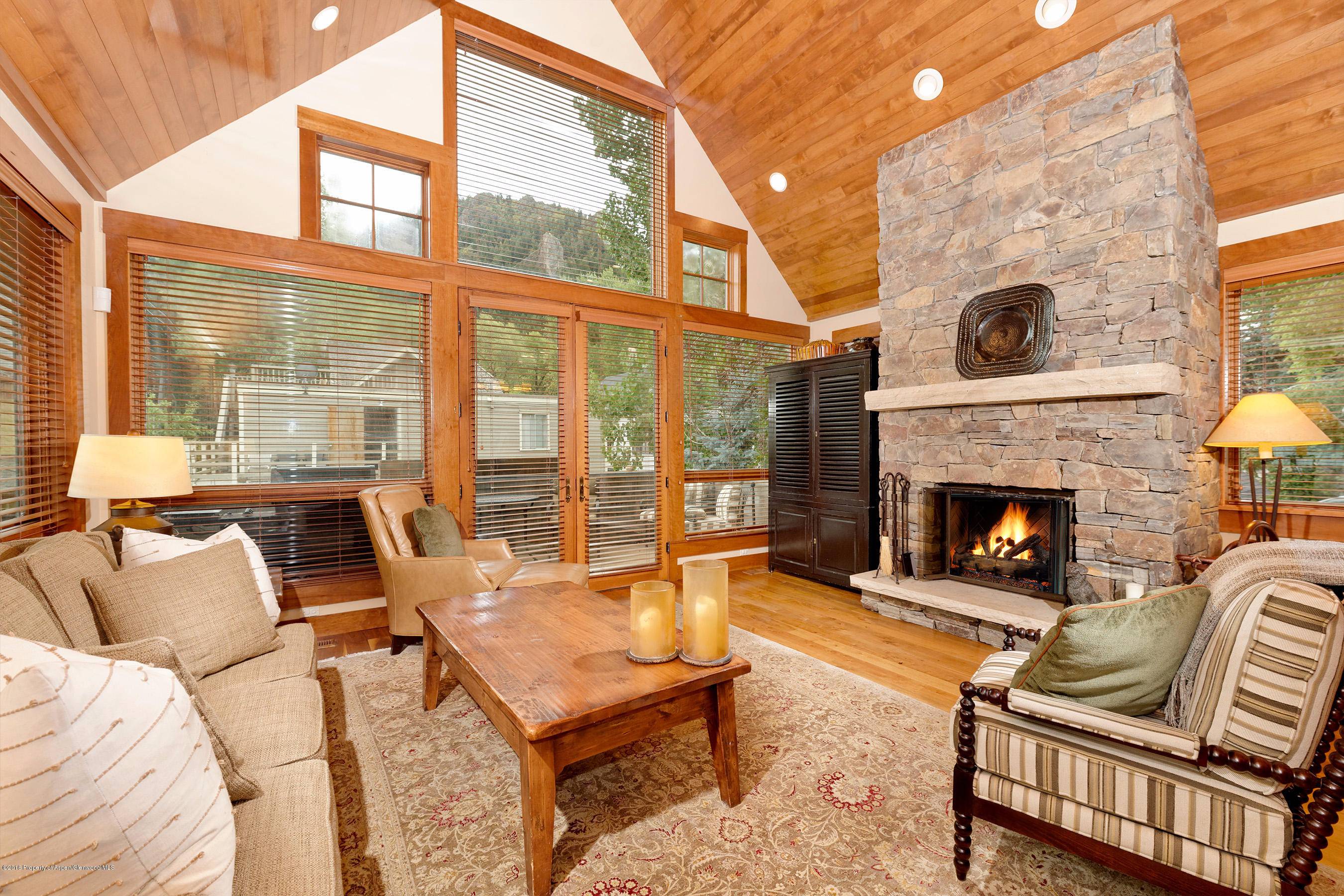 This inviting West End home offers a warm, natural palette with three en suite bedrooms and two half baths.