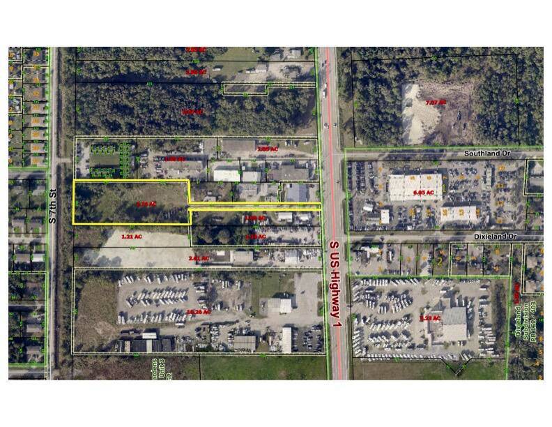 Protected, private 2. 76 acres with access off US1, zoned Light Industrial for many, many uses !