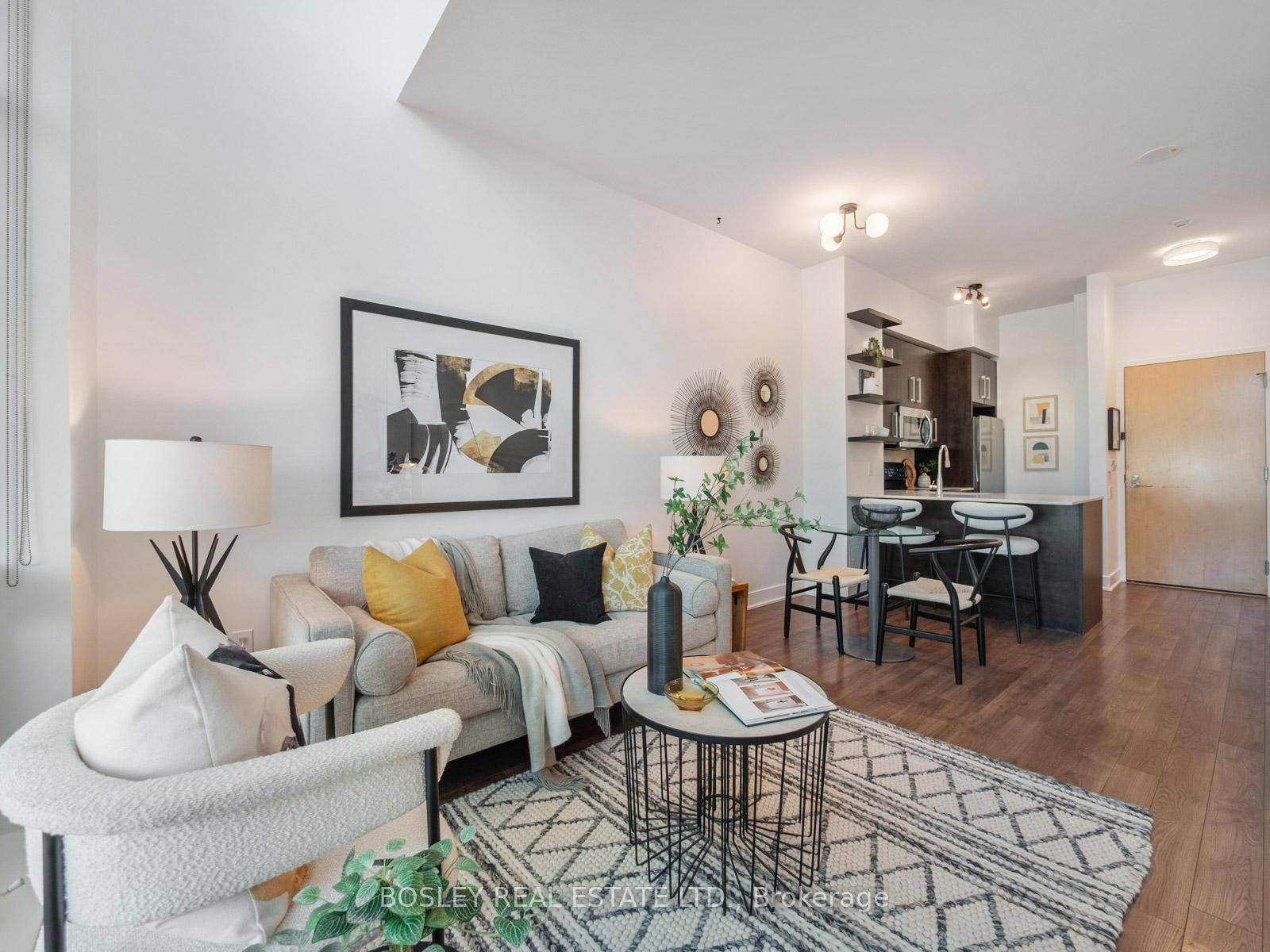 Townhouse style living meets condo convenience in this spacious 1 bedroom den, 2 bathroom end unit at 1048 Broadview Ave.