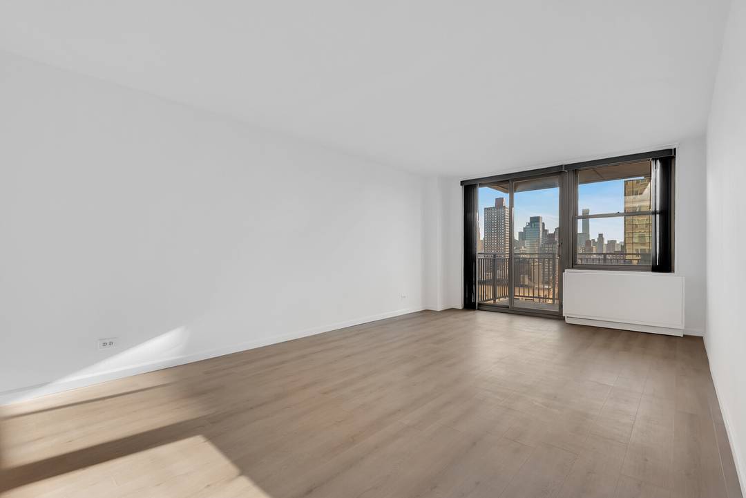 A LARGE ONE BEDROOM WITH THE BALCONY AND VIEWS !