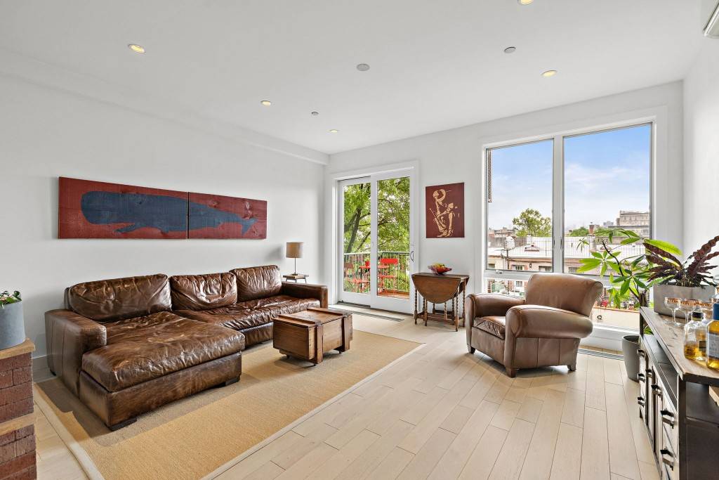 At over 1, 000 square feet, this spacious and sun filled one bedroom, two bathroom apartment can be easily converted into a two bedroom home.