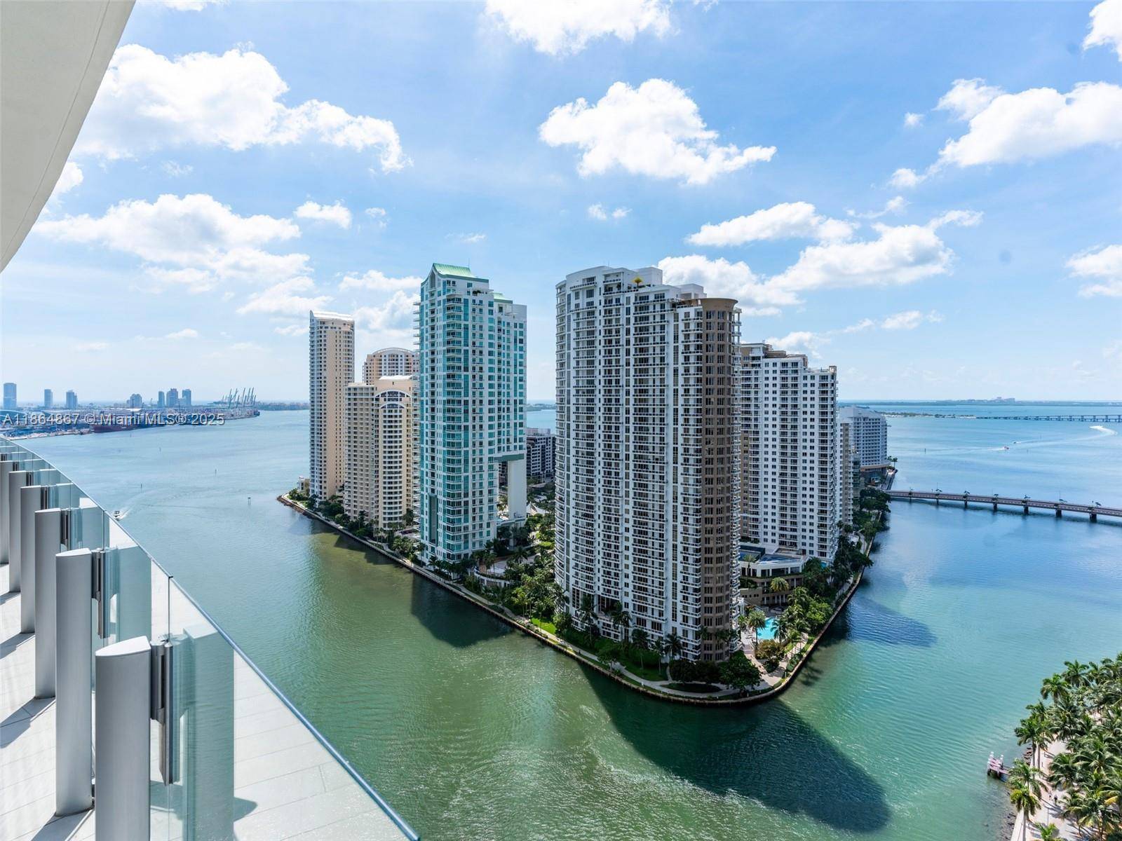 Custom residence at the iconic Aston Martin Residences, offering 2 beds DEN with 3.
