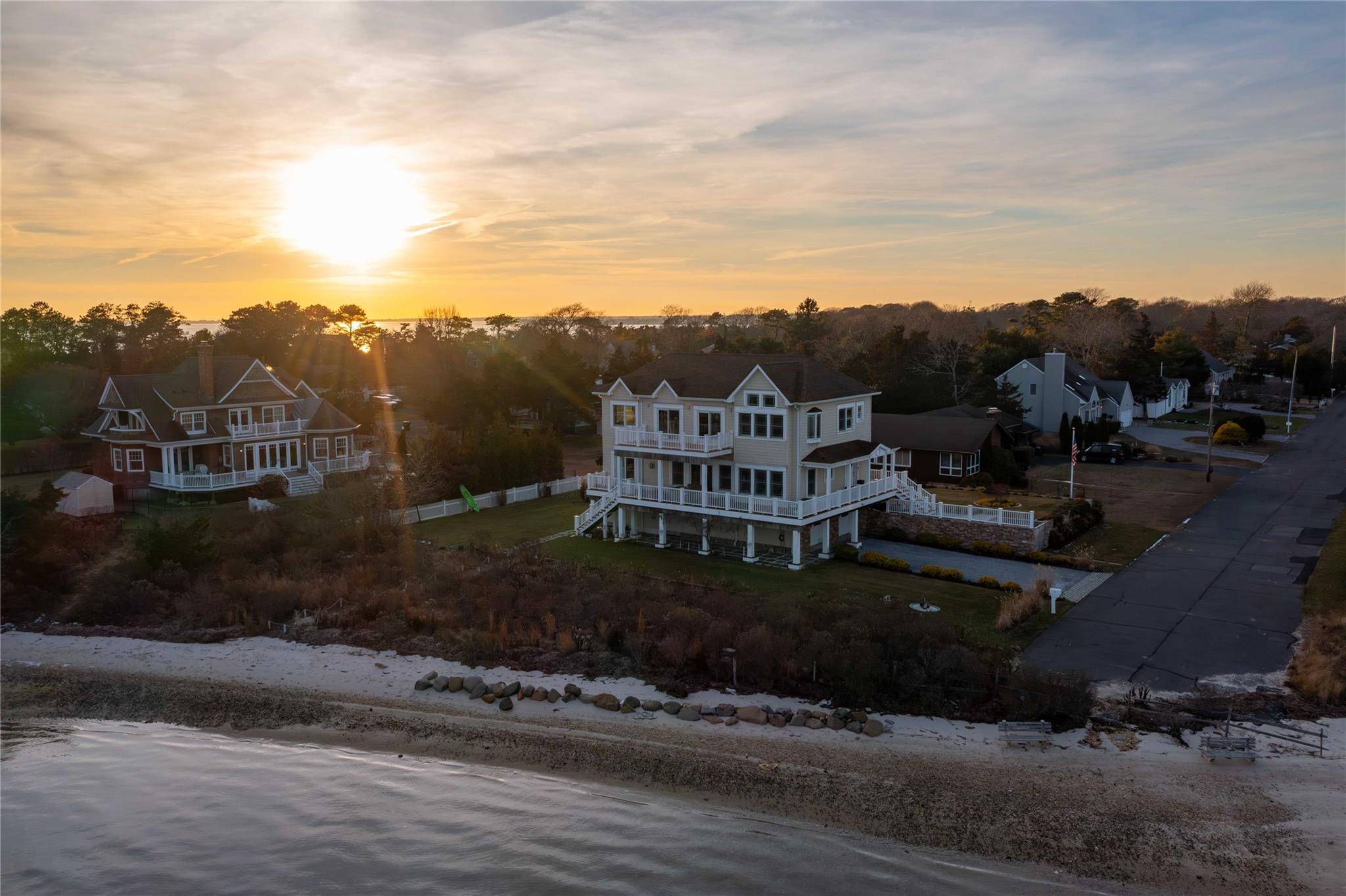 Welcome to your dream waterfront home at 20 Ludlow Lane, Hampton Bays !