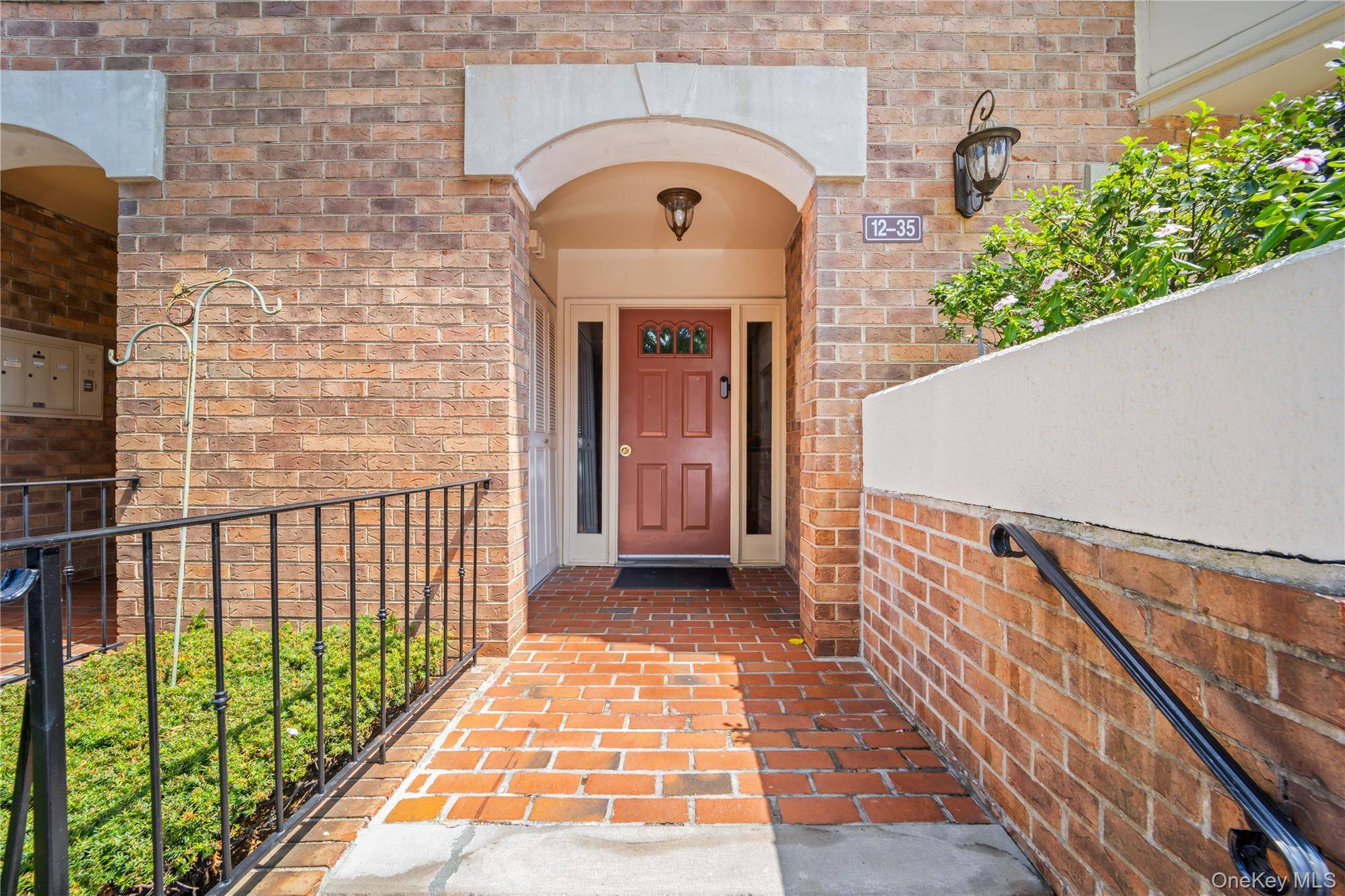 This bright and inviting upper floor unit features two bedrooms and two bathrooms, providing ample space for comfortable living.