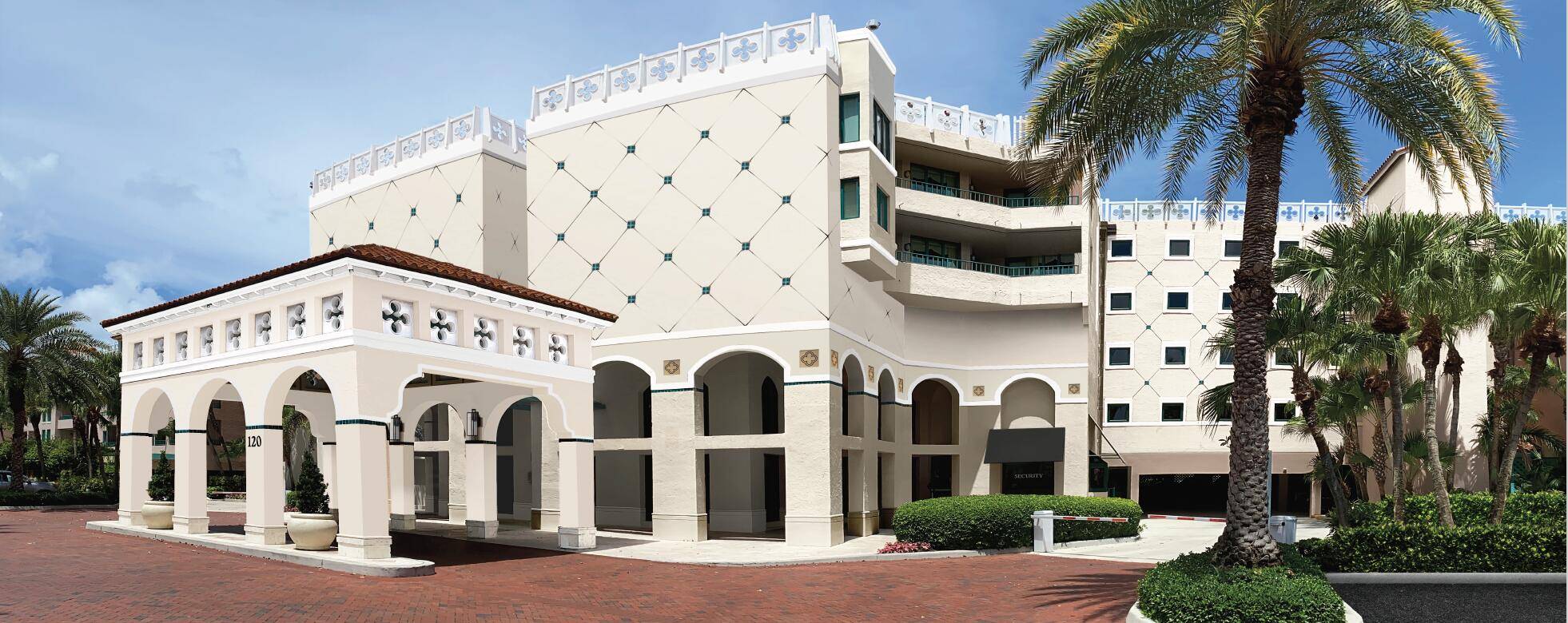 Situated in the highly desirable Mizner Court, this beautifully remodeled Floresta model showcases exceptional craftsmanship and attention to detail.