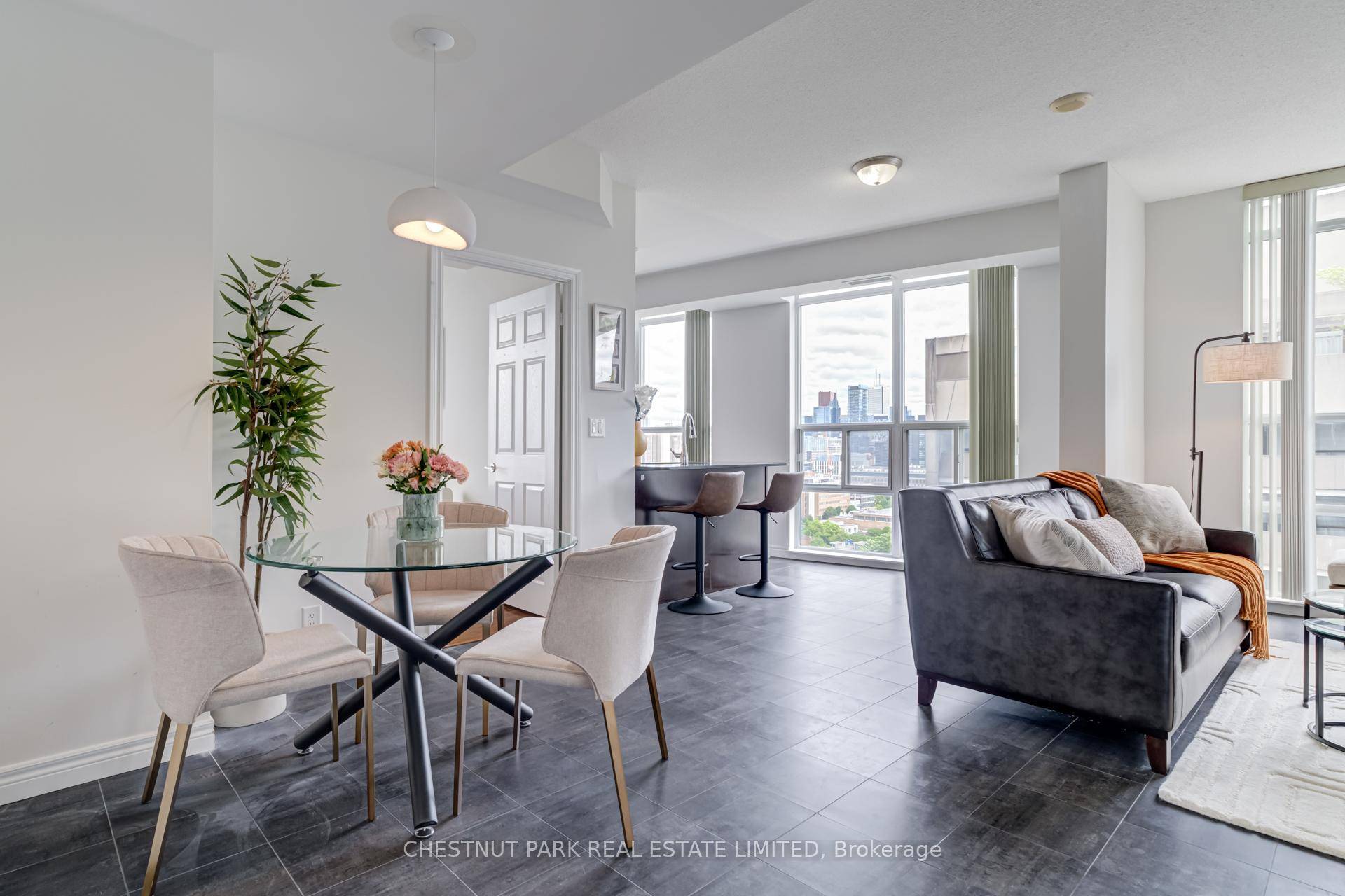 Rarely Offered Executive Corner Suite Offering 1, 100 Square Feet Of Thoughtfully Designed Living Space, Flooded With Natural Light Through Soaring 9 Foot, Floor To Ceiling Windows.