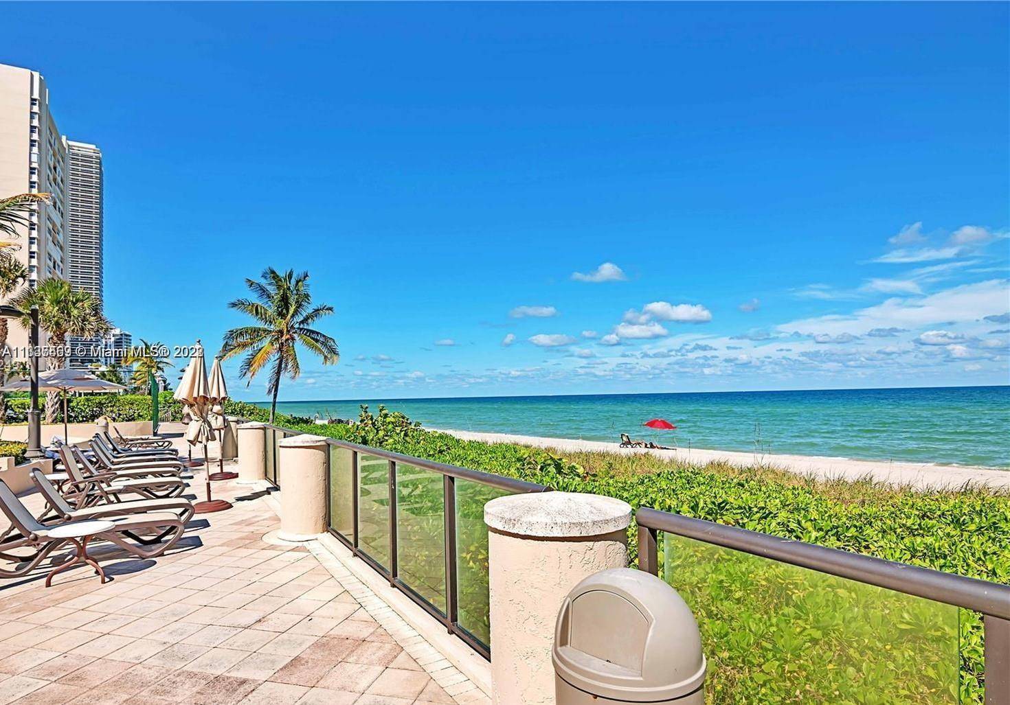 Freshly updated apartment with a direct ocean view from every room and kitchen in one of the best maintained buildings in Hallandale on the sand.