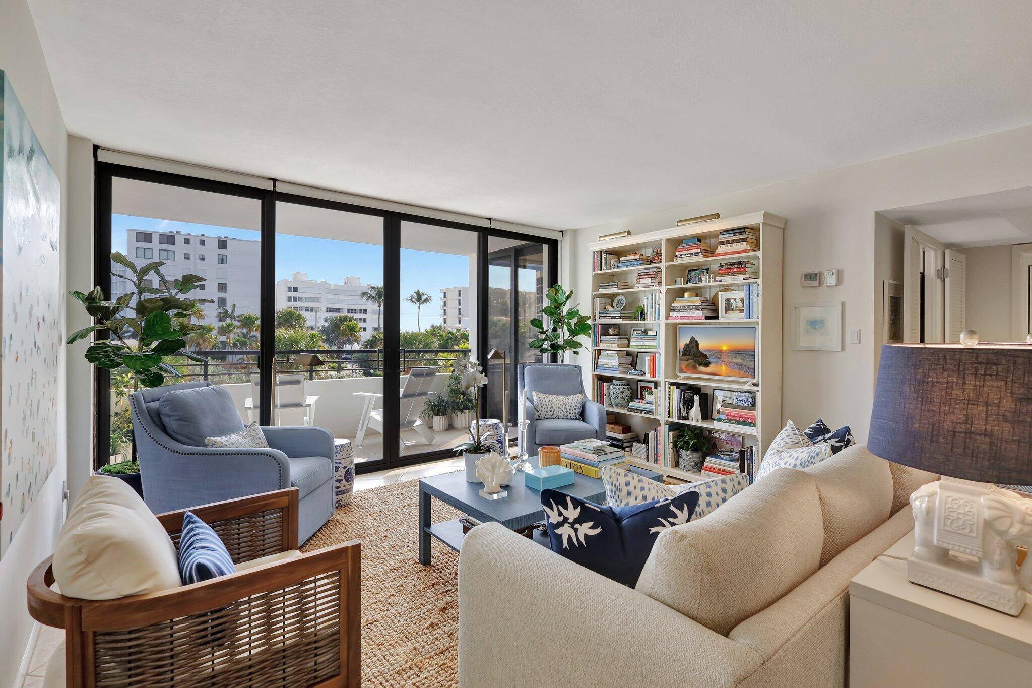 Light and Bright ! Updated 2 2 facing east with lovely ocean views between the buildings.