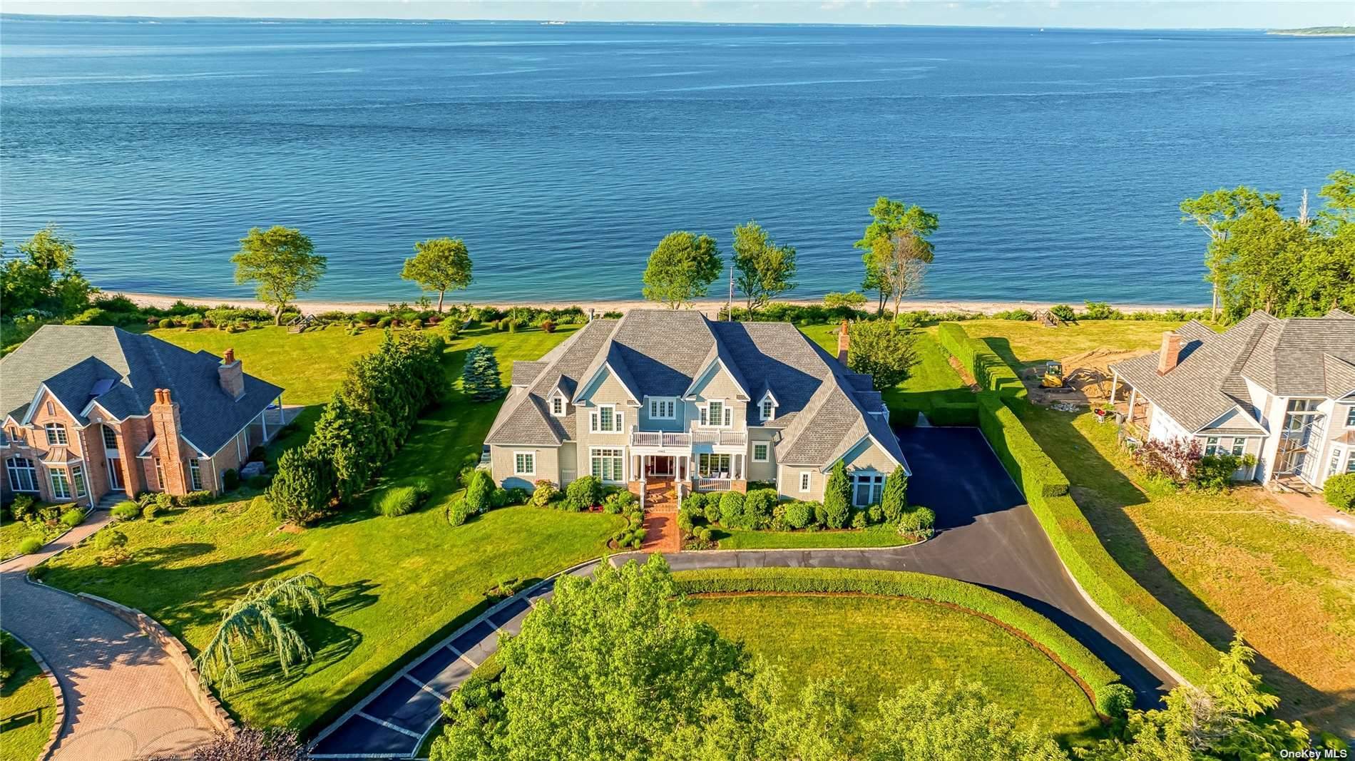 Orient, North Fork Nantucket inspired waterfront estate w 130'private beach.