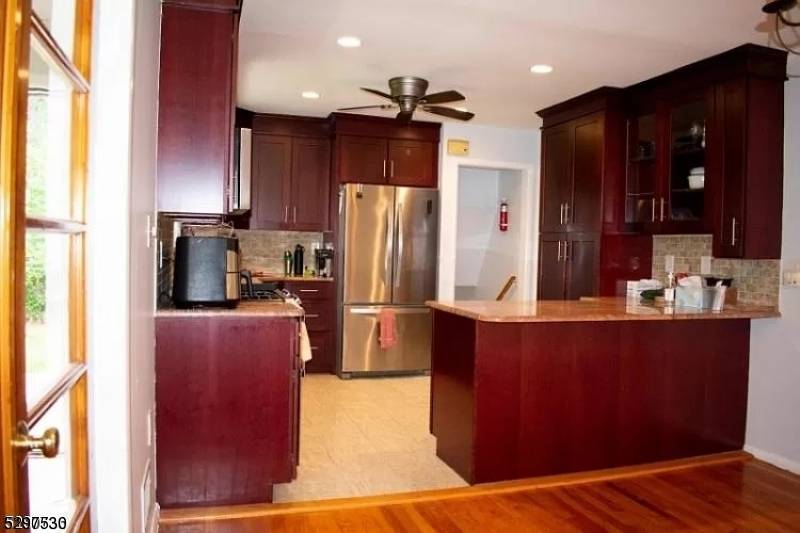 Collins Split Level home offers 3 bedrooms, 2 1 2 baths.