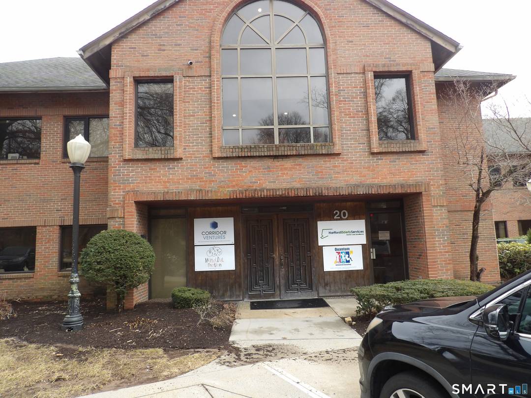 A well maintained office building on second floor in office complex.