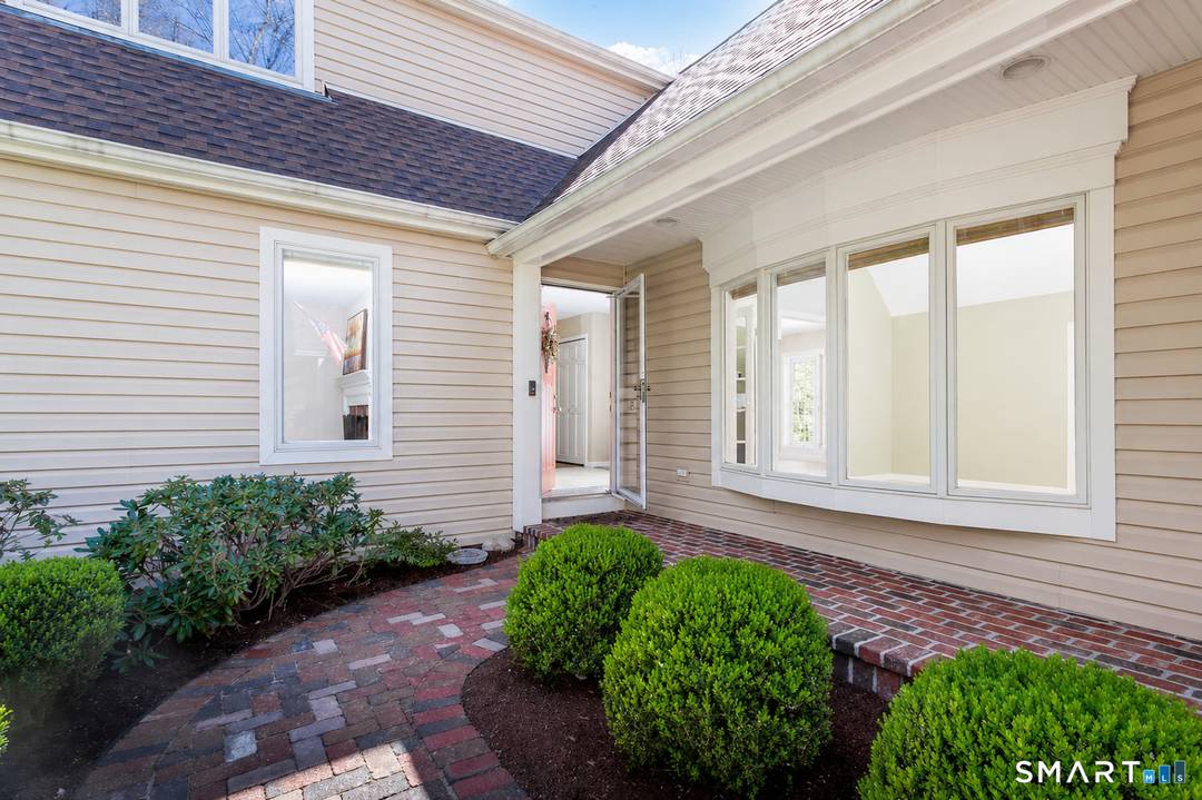 Welcome to this beautifully maintained 4 bedroom, 3 bath home in the sought after Barkwood Falls lake community, set on a picturesque 2 acre wooded corner lot offering comfort, style, ...
