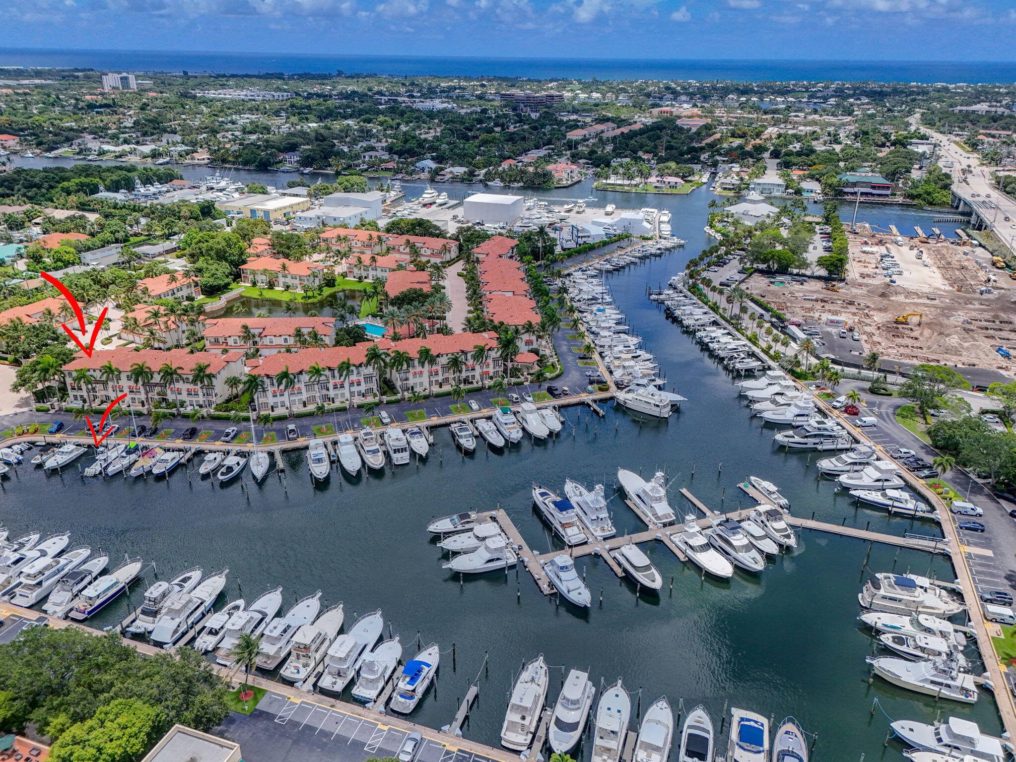 Indulge In Luxury Waterfront Living in this Beautifully Updated 3 Story Corner Townhouse, Complete w a 45' Boat Slip Directly Behind Unit, Located in the Exclusive Gated Community of Marina ...