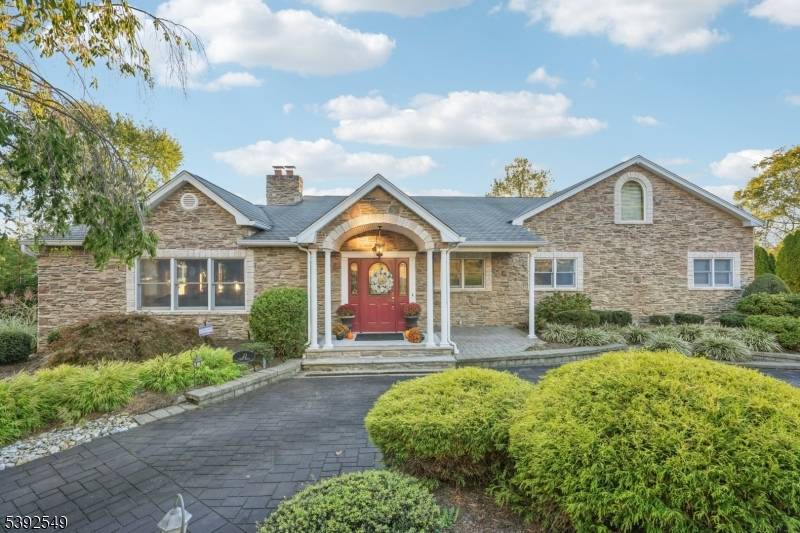 Welcome home to this beautifully maintained 4, 900 sq ft Ranch nestled on a thoughtfully landscaped lot.