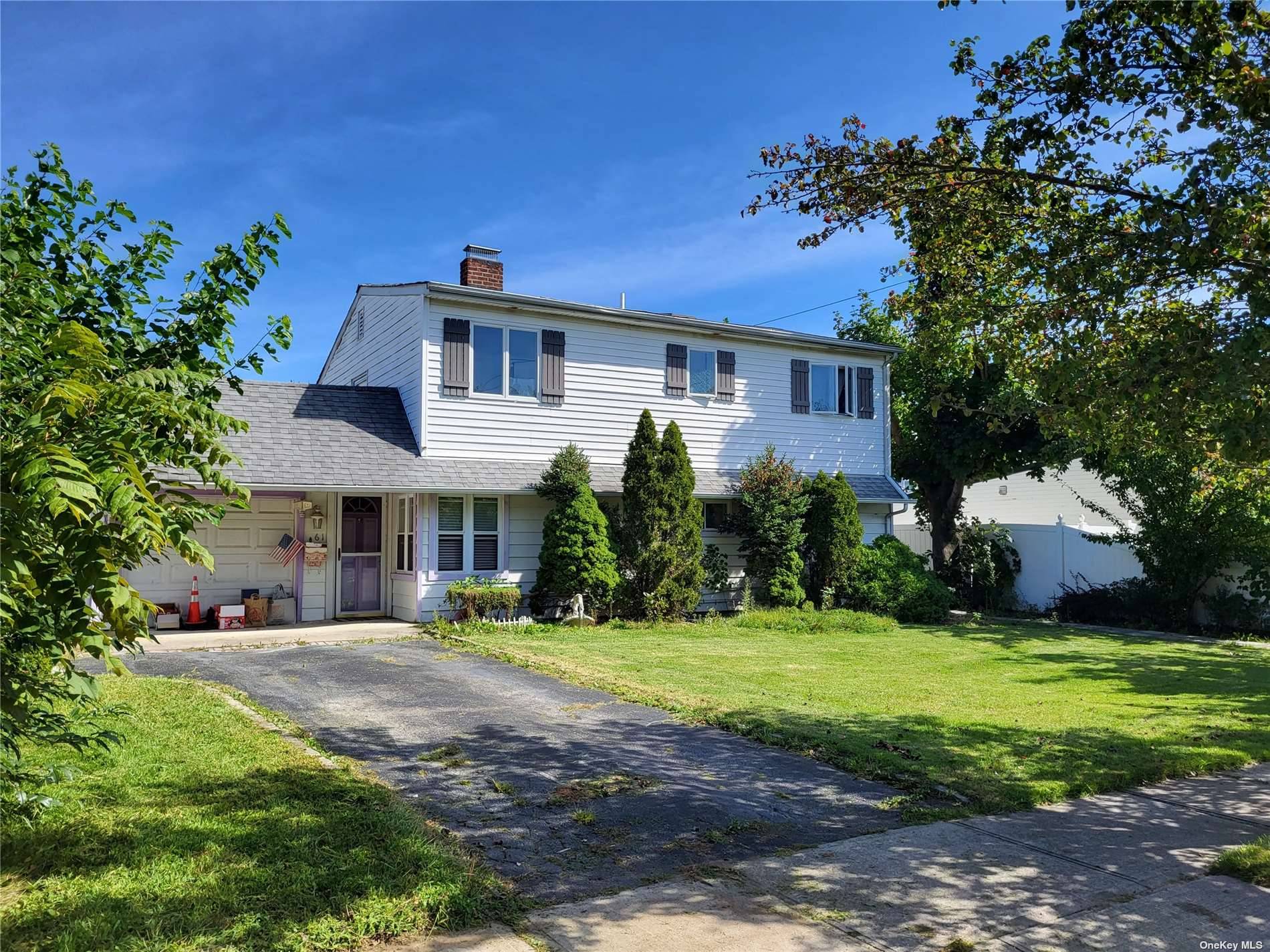 New wooden floors, New roof, New kitchens, Separate Laundry room, Garage renovated with side entrance, 2 heavy duty wooden decks.