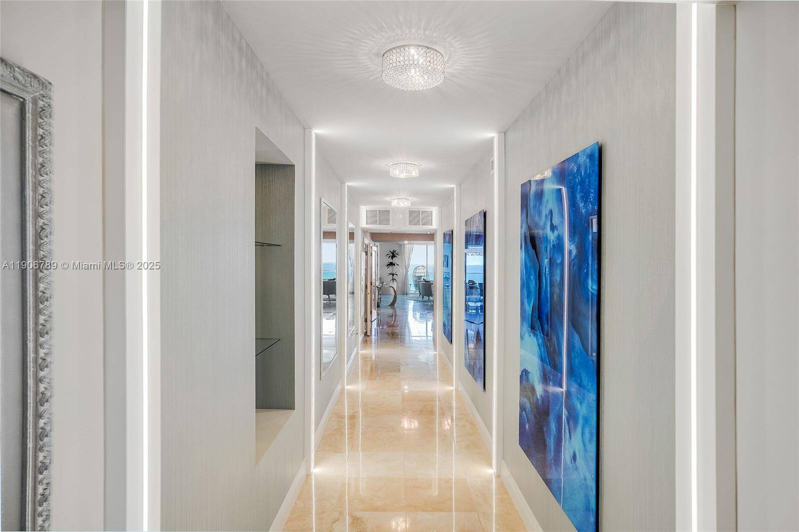 Spectacular panoramic views of Golden Beach, the ocean, and the Intracoastal from this fully renovated residence at Hamptons South, Aventura.