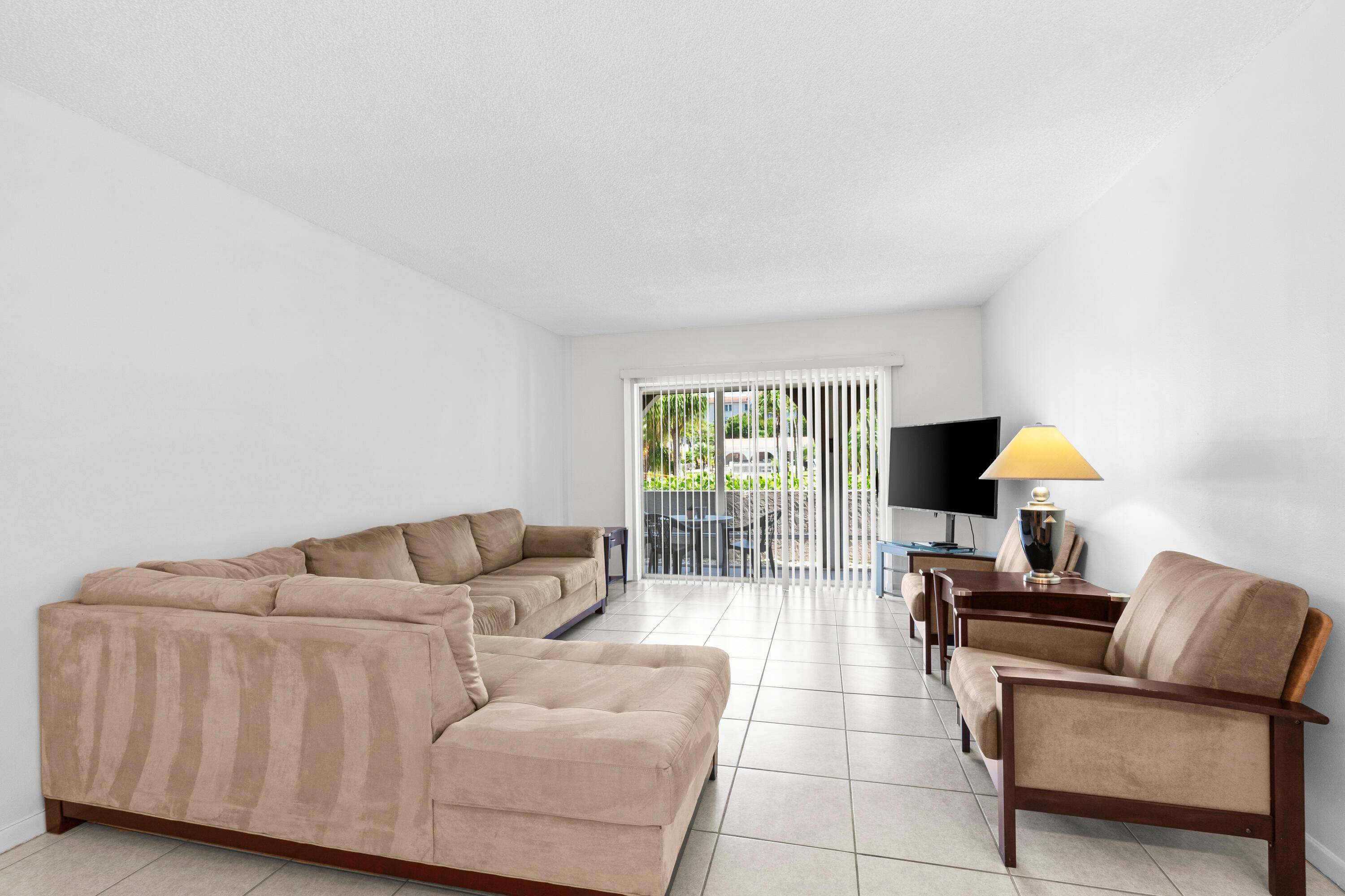 A FIRST floor 2 bed 2 bath freshly painted spacious condo at an UNBEATABLE PRICE in a 55 community in East Boca Raton !