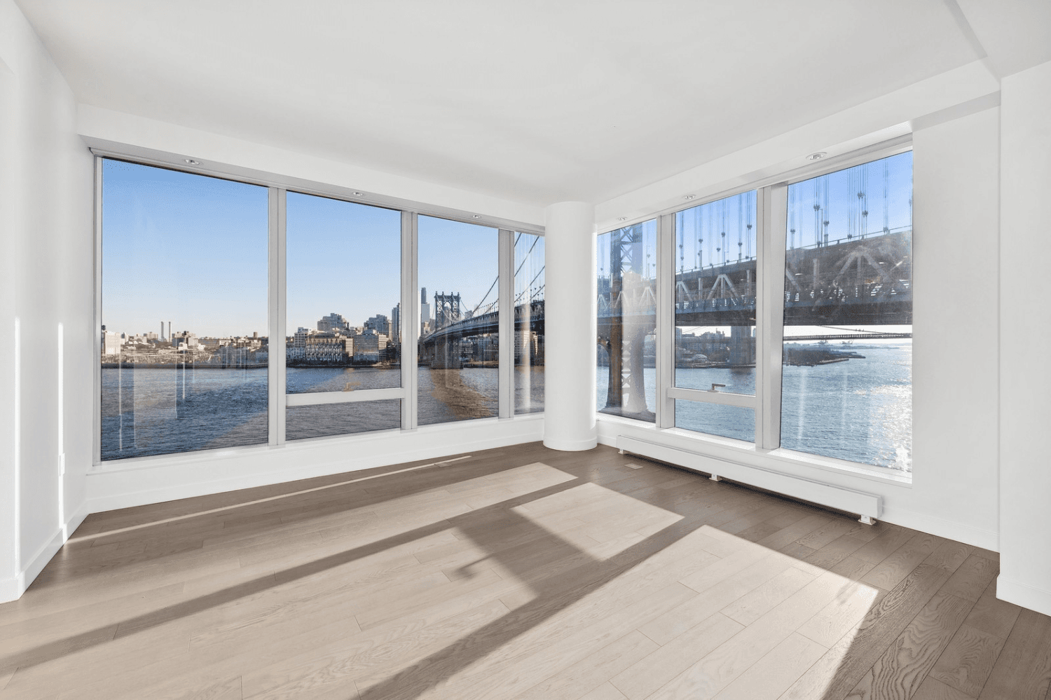 Waterfront Living Two Bedroom Condo at One Manhattan SquareCome home to this sun drenched corner two bedroom, two bath home with stunning views of the East River and Manhattan Bridge ...