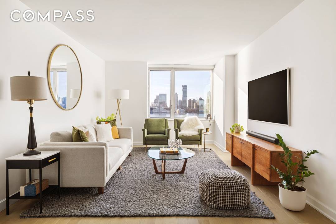 Enjoy waterfront living on the 14th floor with sweeping western Hudson River views and incredible sunsets at the Solaire, a co op with condo rules designed by Pelli Clarke Pelli ...