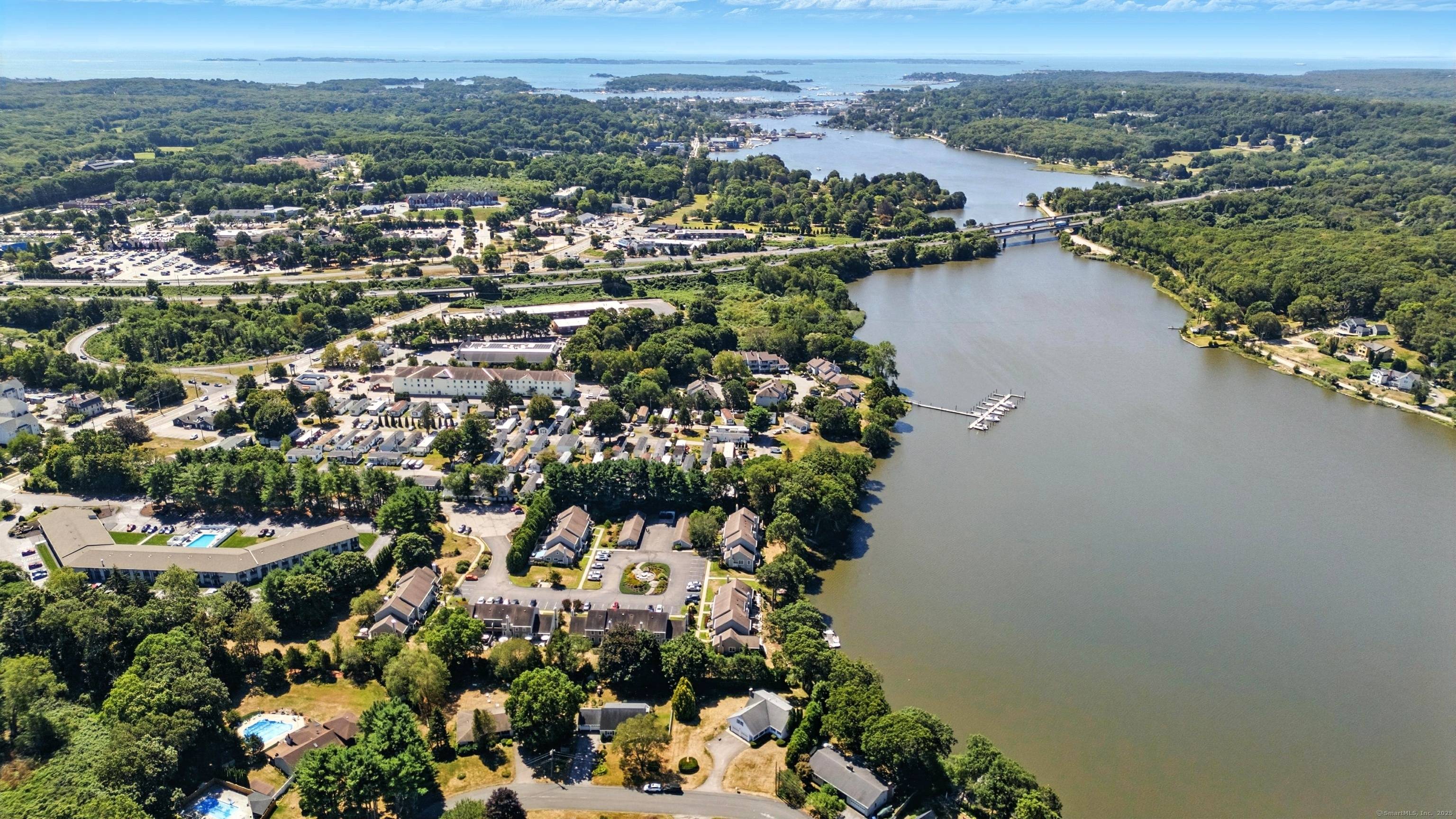 A remarkably rare offering along the coveted Mystic River, this gracious residence pairs timeless charm with tremendous water views magical at any hour, unforgettable at sunset.