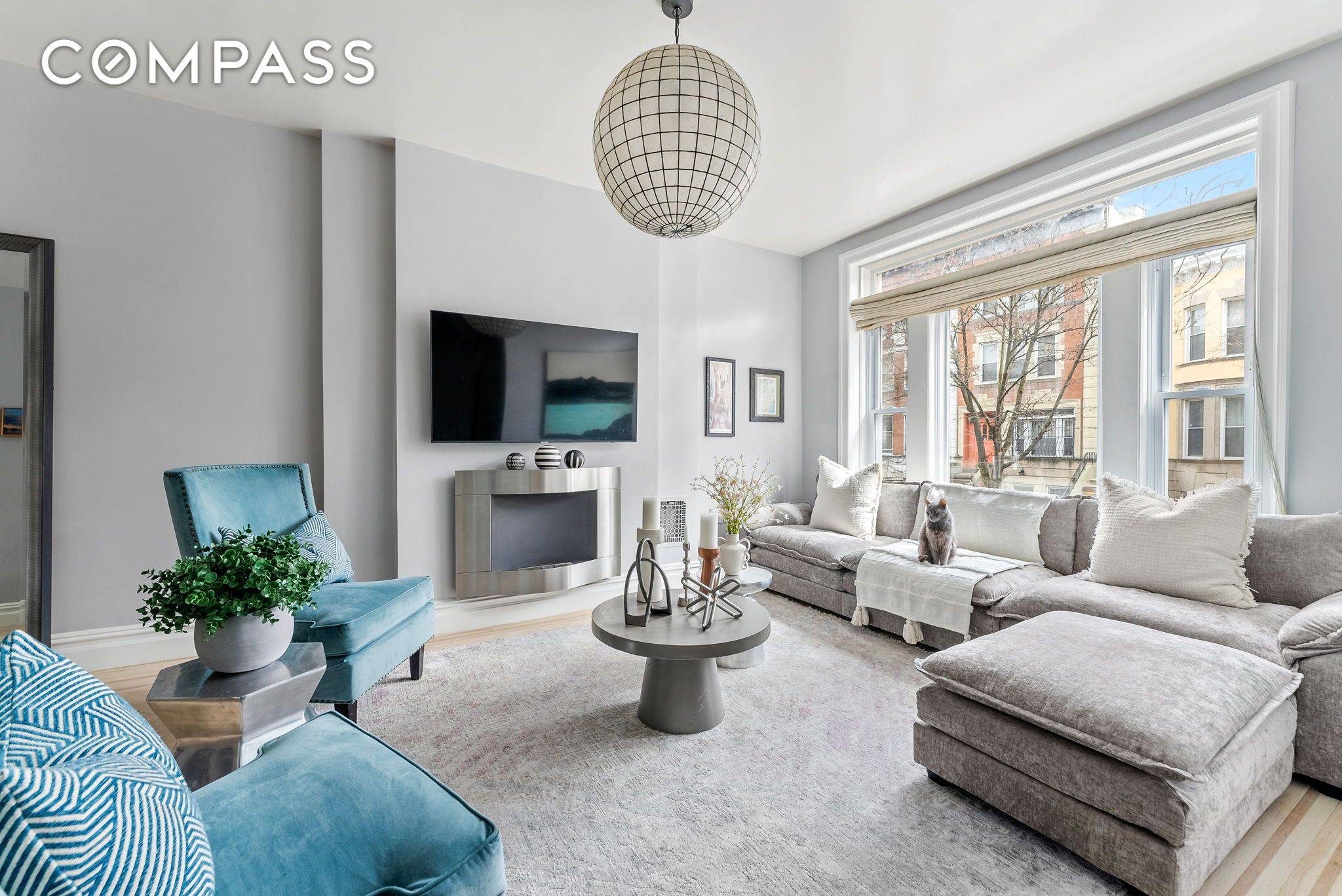 Located on one of the most charming streets in Crown Heights, this beautiful townhome is the epitome of modern elegance with 19th century details.