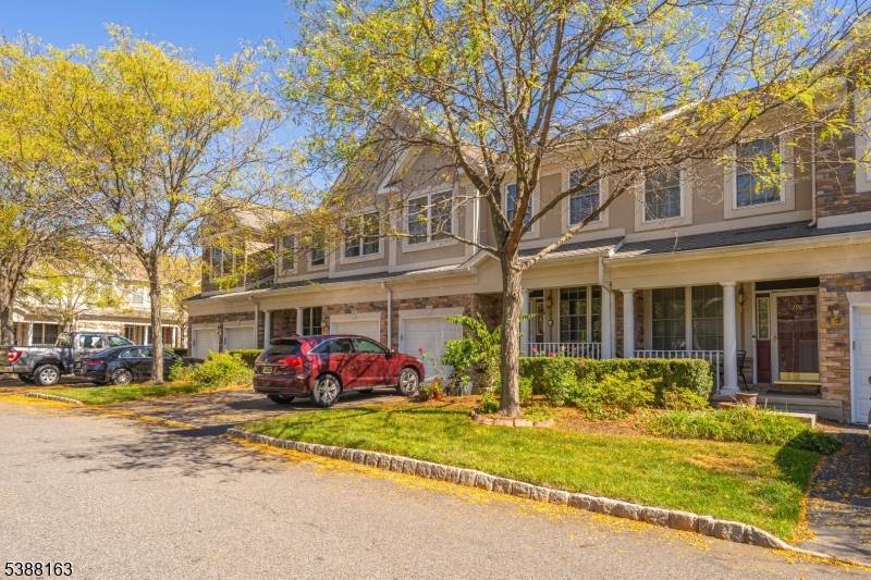 Welcome to this immaculate move in ready Bradley Unit in the highly desirable Grandover Pointe community.