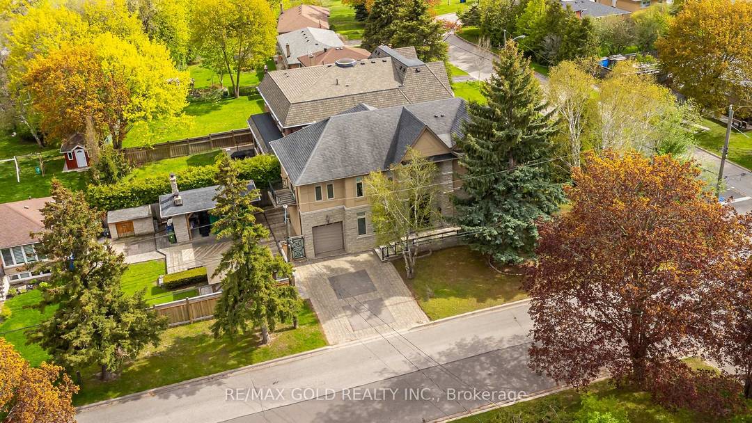 Prepare to be captivated by this custom built Stone amp ; Stucco masterpiece, commanding a prominent corner lot in one of North York's most prestigious family enclaves.