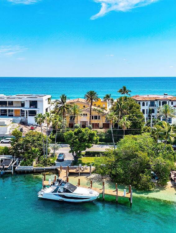 Welcome to 955 Hillsboro Mile, a Spanish style Mediterranean estate set along the prestigious Millionaire's Mile in Hillsboro Beach.