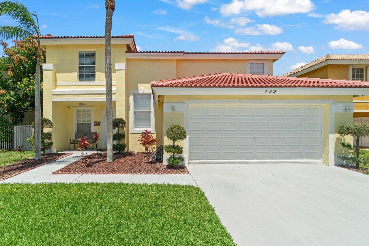 Lakefront gem in gated Boynton Estates !