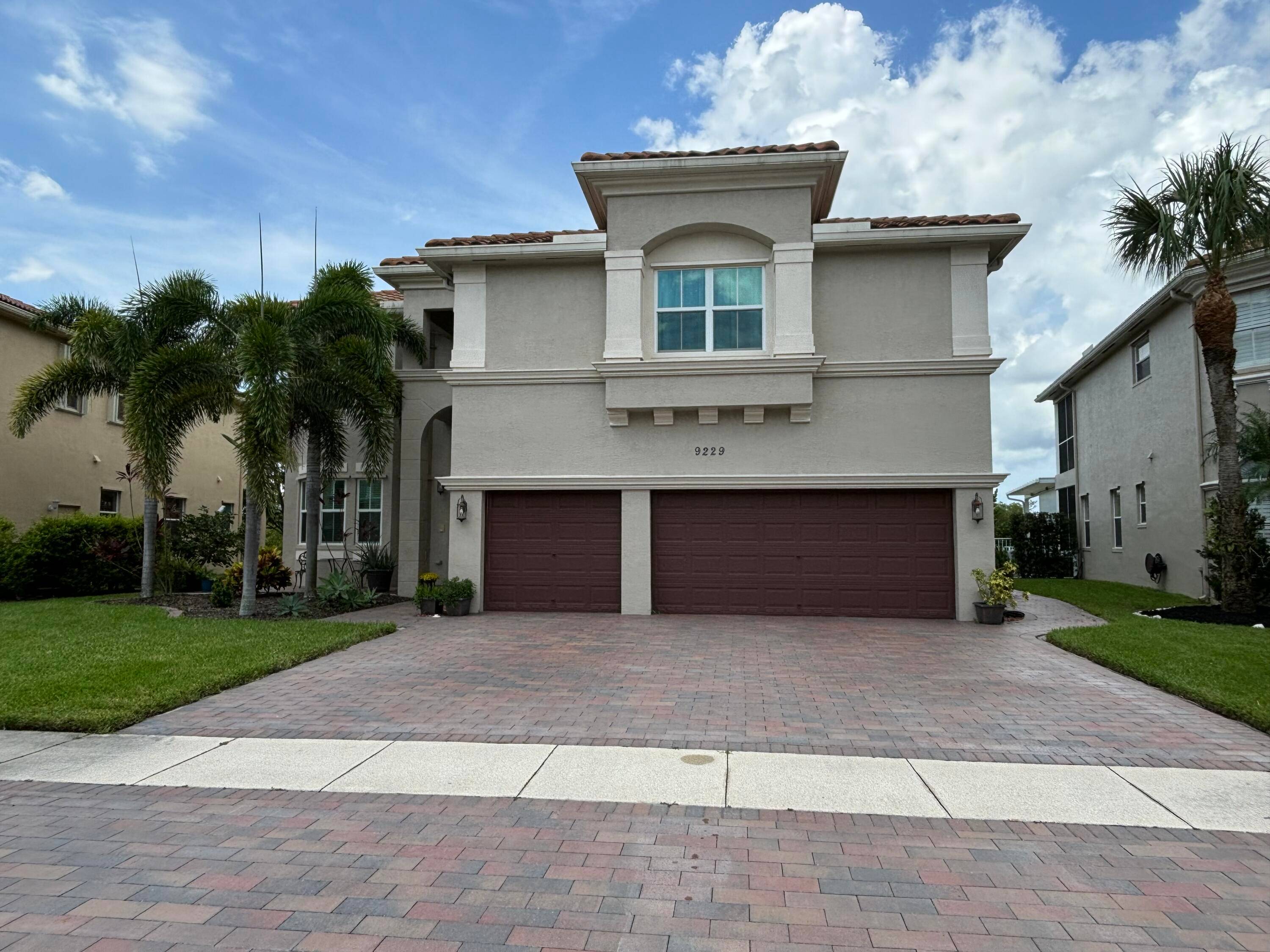 Welcome to this beautifully remodeled 6 bedroom, 4 bathroom home in Wellington's prestigious Olympia community.