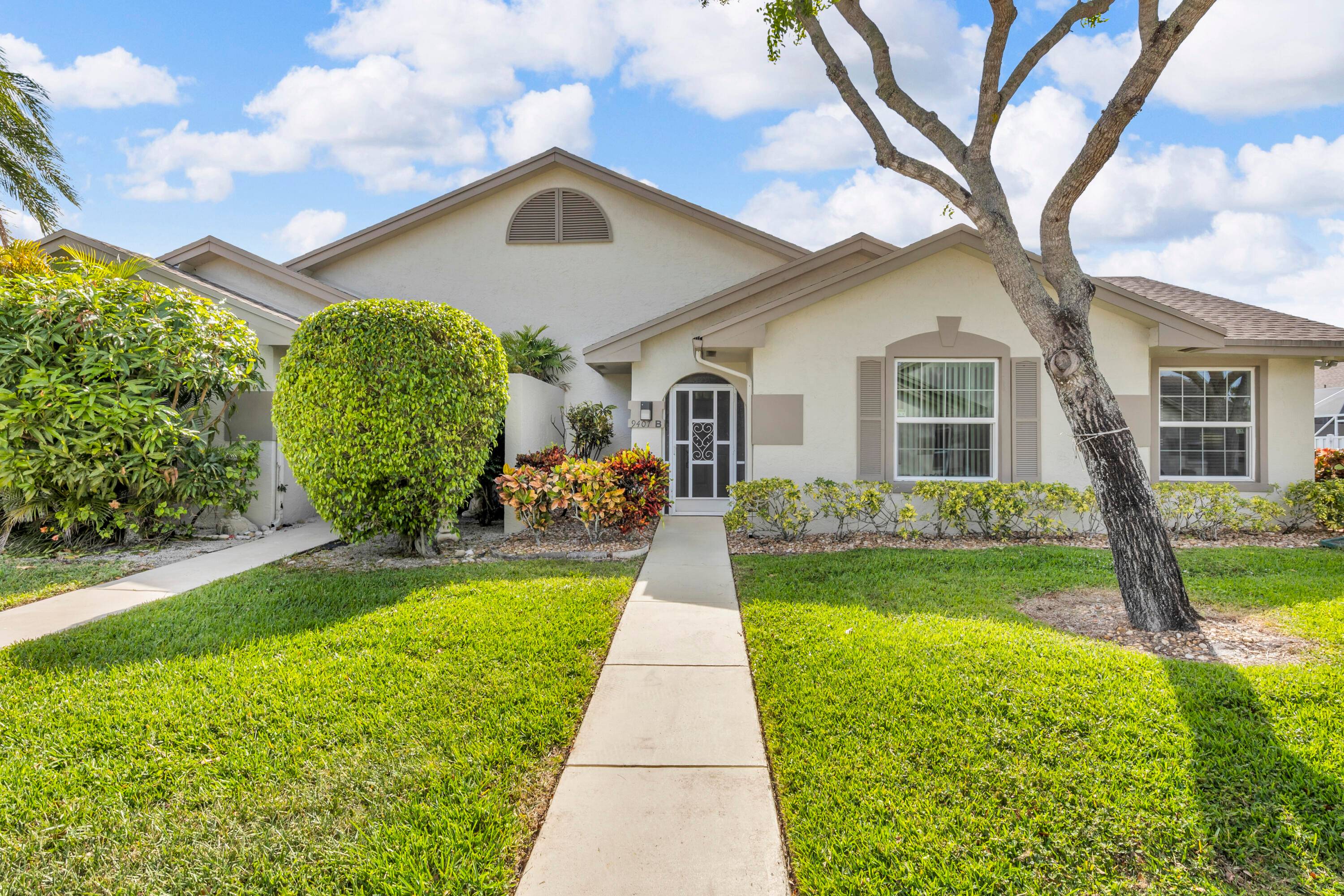 Three bedroom Villa with a private pool located in the desirable community of Boca Gardens.