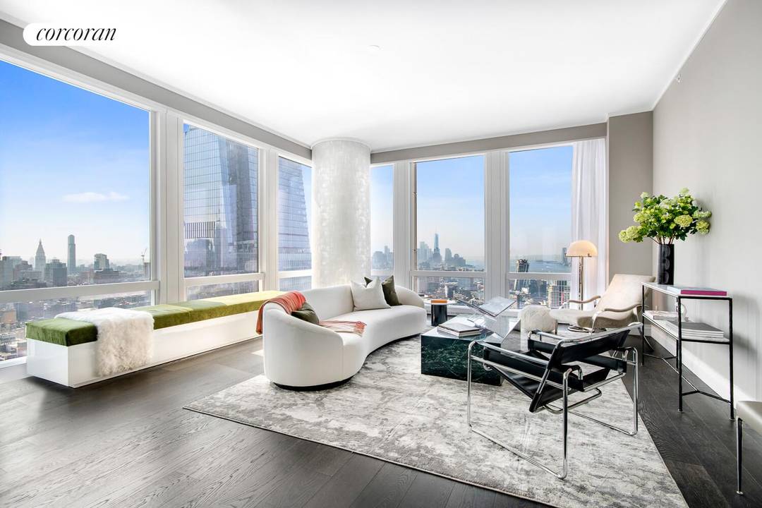 EXPERIENCE SPECTACULAR VIEWS OF THE HUDSON RIVER FROM THIS GRACIOUS CORNER THREE BEDROOM HOME.