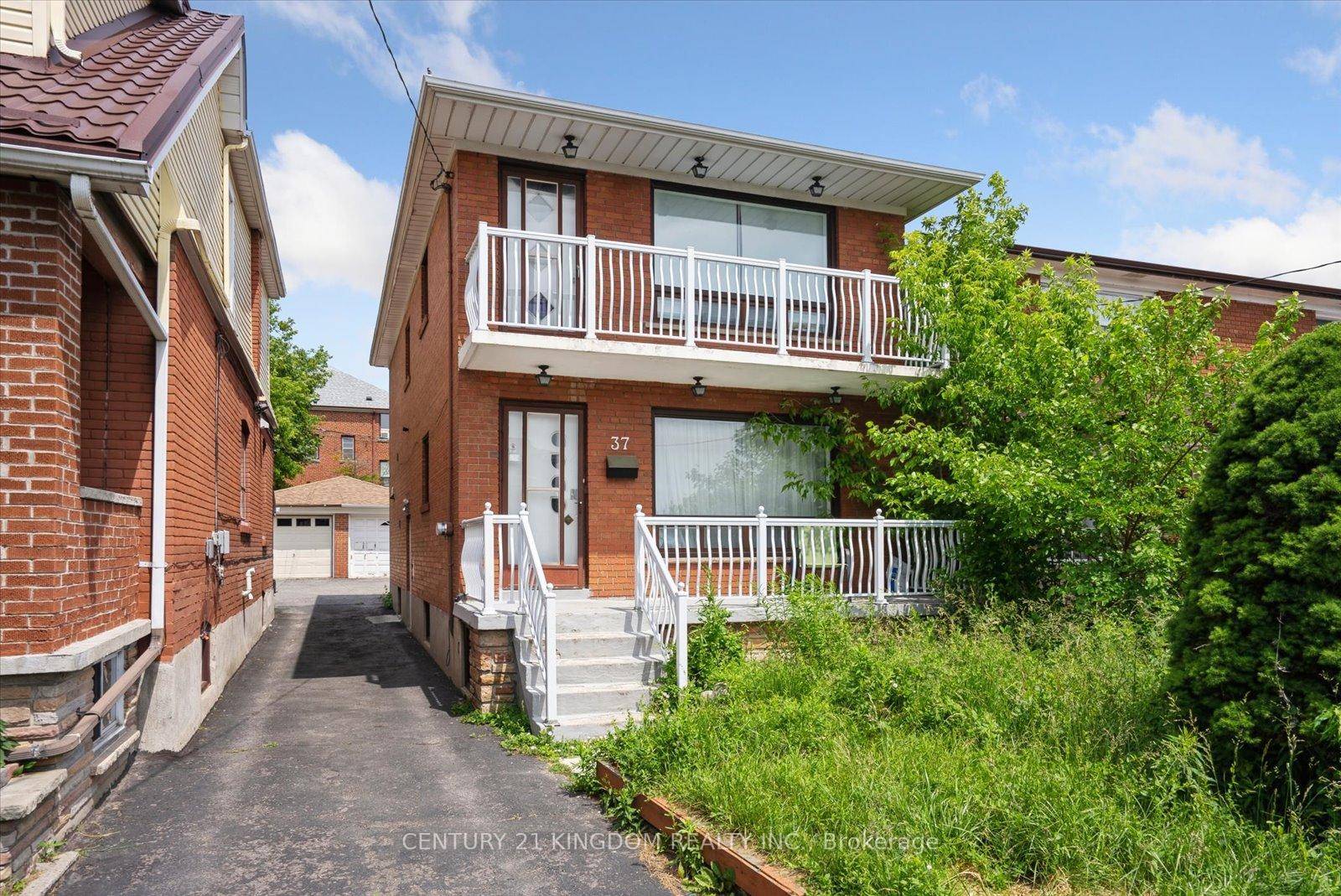 Welcome to this beautifully renovated lower level apartment at 37 Robinson Avenue, perfectly located near Pharmacy and Danforth.