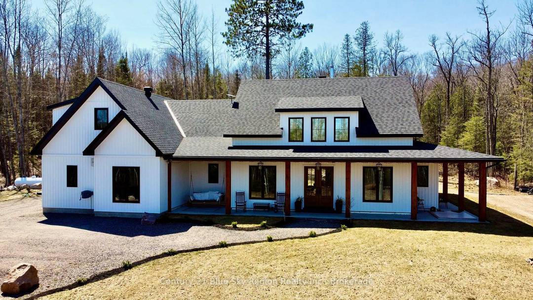 Built in 2023, this custom home is set on just over 13 acres of private, wooded land and offers an exceptional blend of thoughtful design, quality finishes, and privacy.