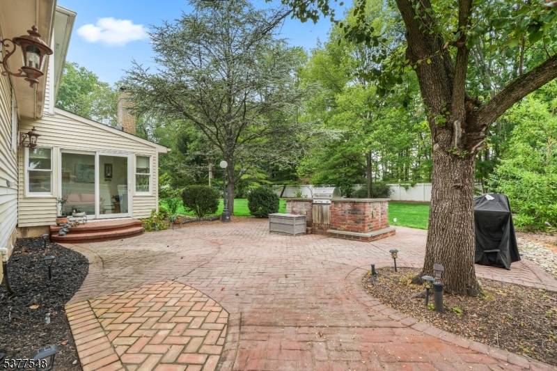 Elegant 4 BR, 3. 5 Bath Brick Front Colonial with designer upgrades.