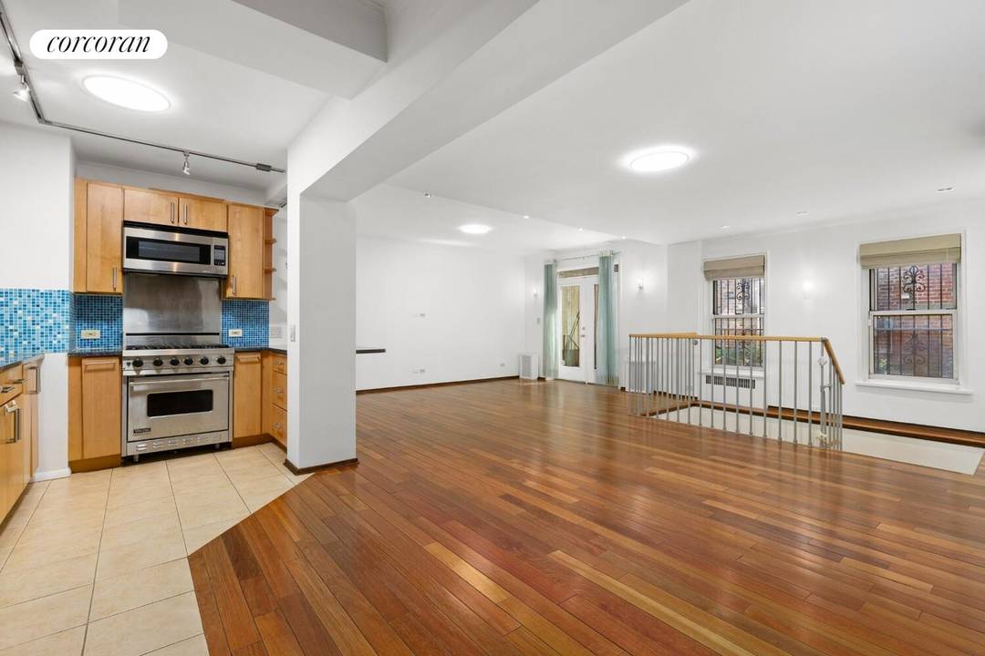 Dream Duplex home with an exceptional outdoor garden patio, nestled in the vibrant heart of Chelsea at 210 West 19th Street !