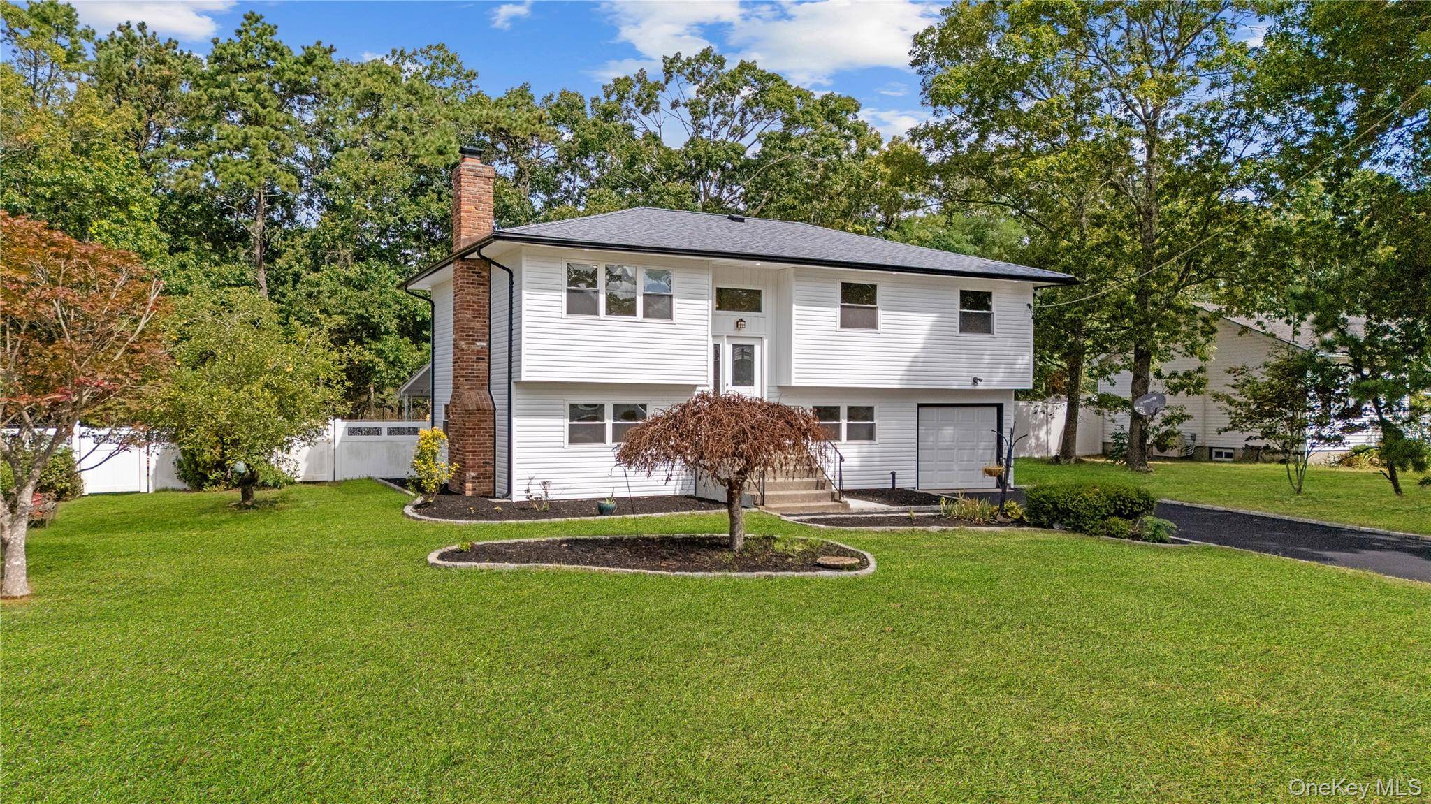 Welcome to this fully renovated move in ready Hi Ranch in Shirley featuring 4 bedrooms and 2 full baths.